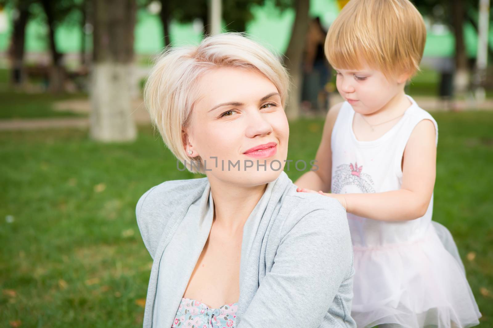 portrait of beautiful mother and kid girl