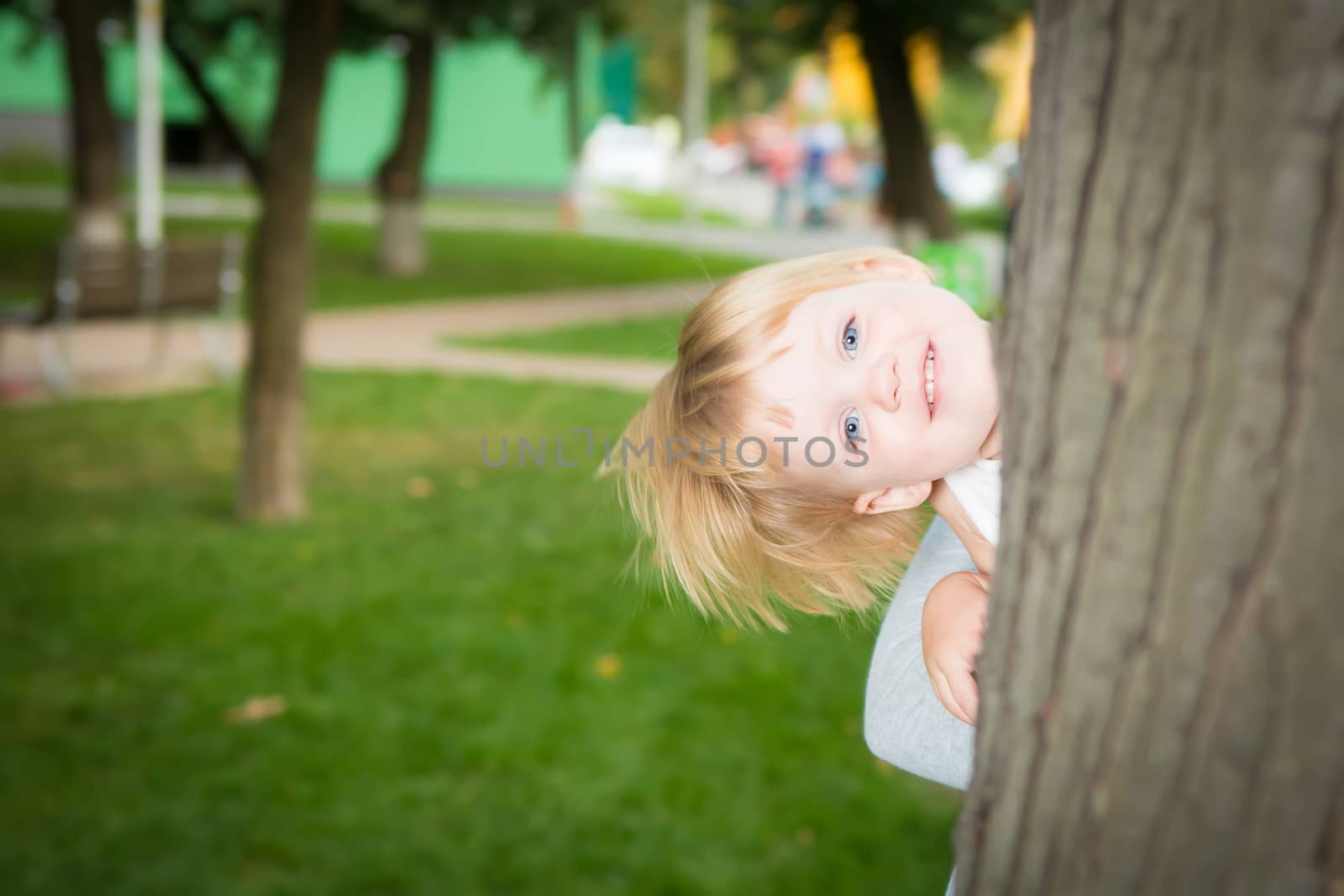 Outdoor portrait  of cute little girl in summer day