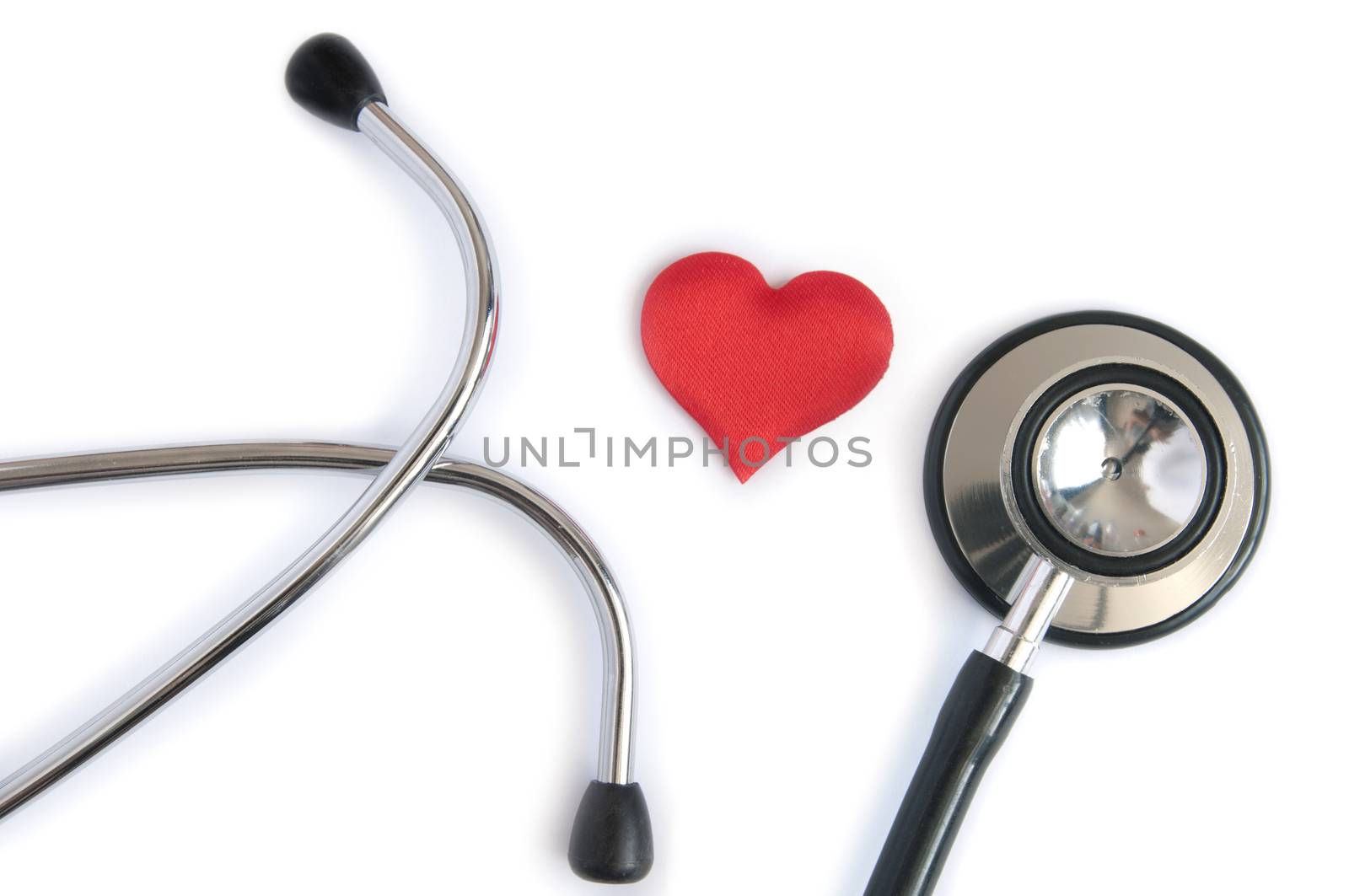 Medical stethoscope with heart shape over a white background