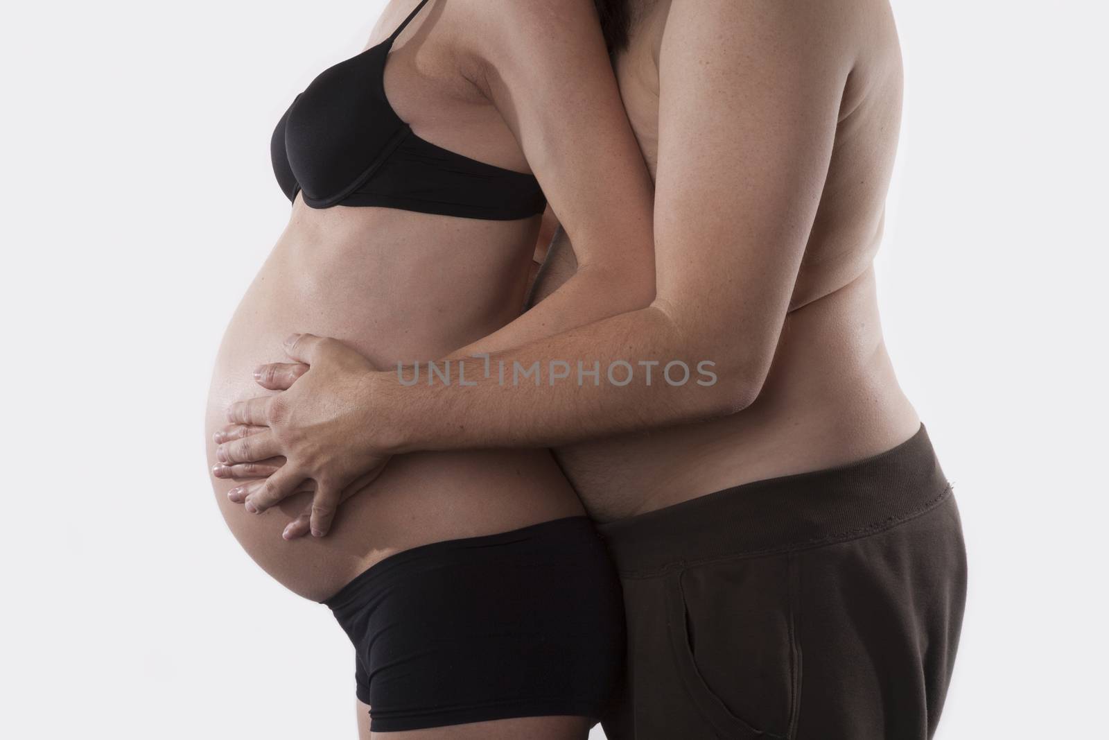 pregnant woman and fat man in love on white background