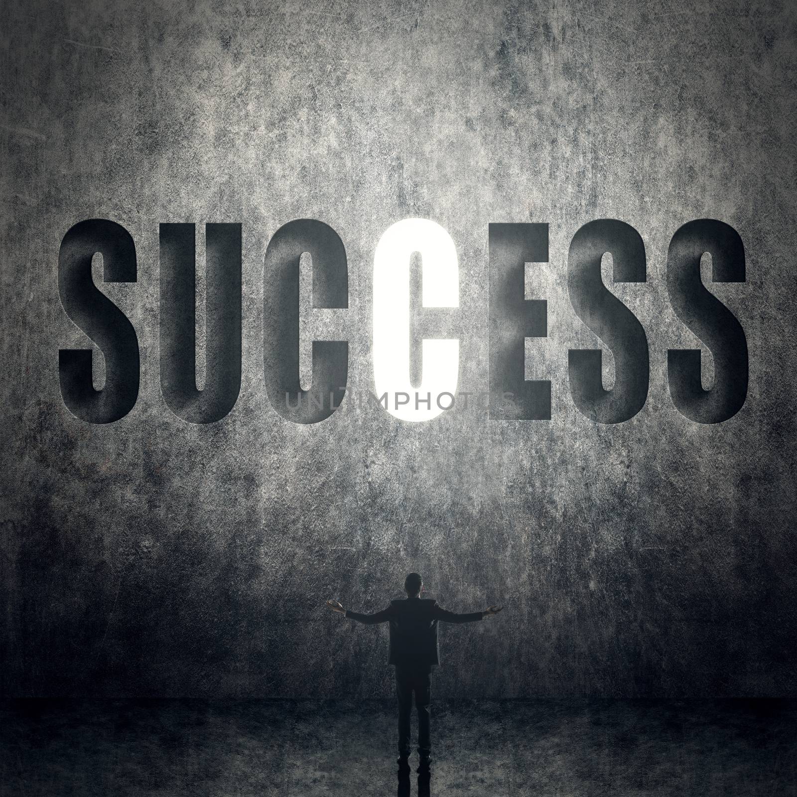 Concept of success, man stand on wall with text.