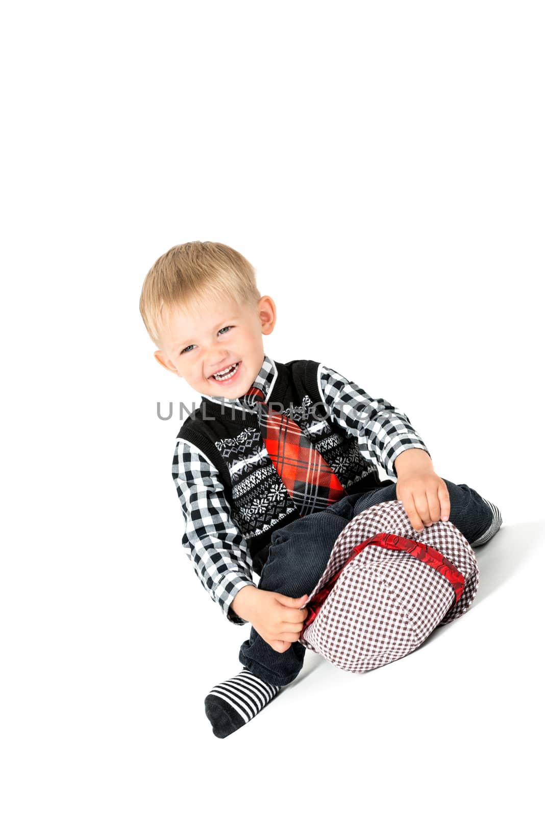 Laughing boy studio shot isolated on a white background by Nanisimova