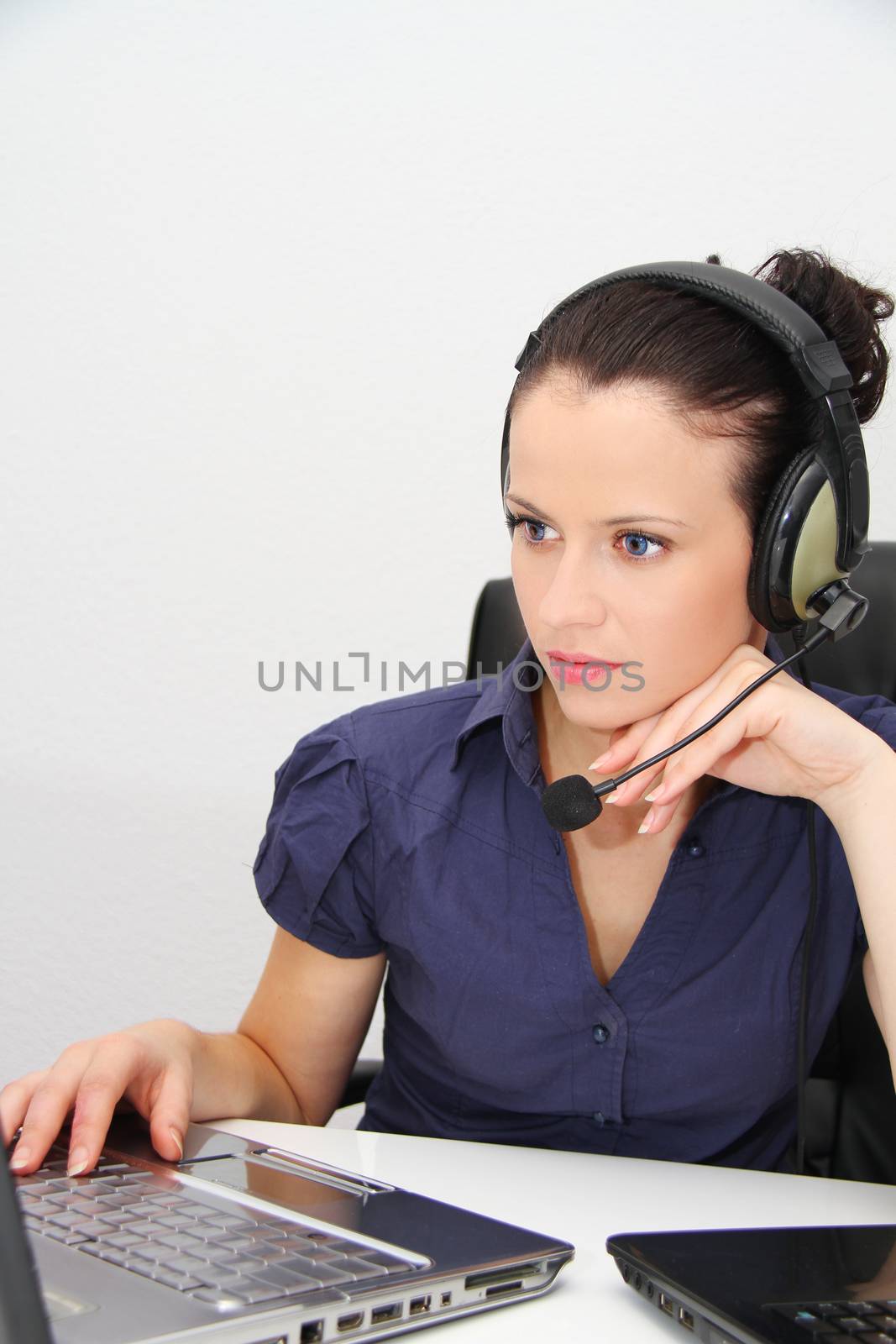 Female customer support operator with headset