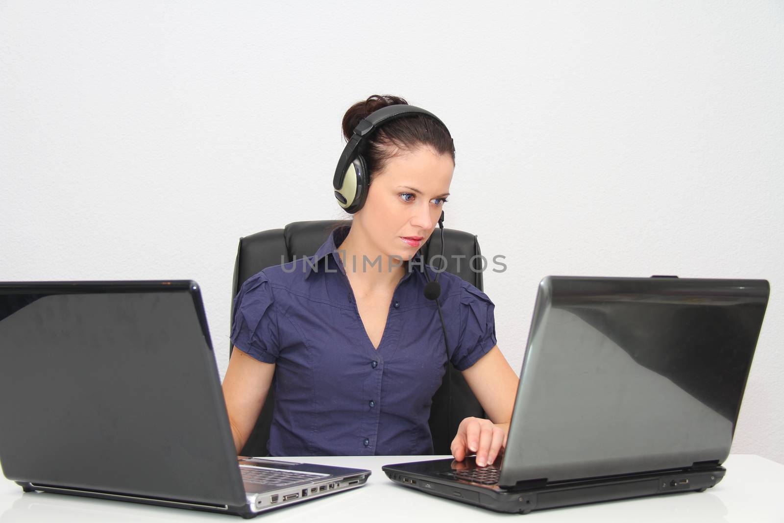 Female customer support operator with headset