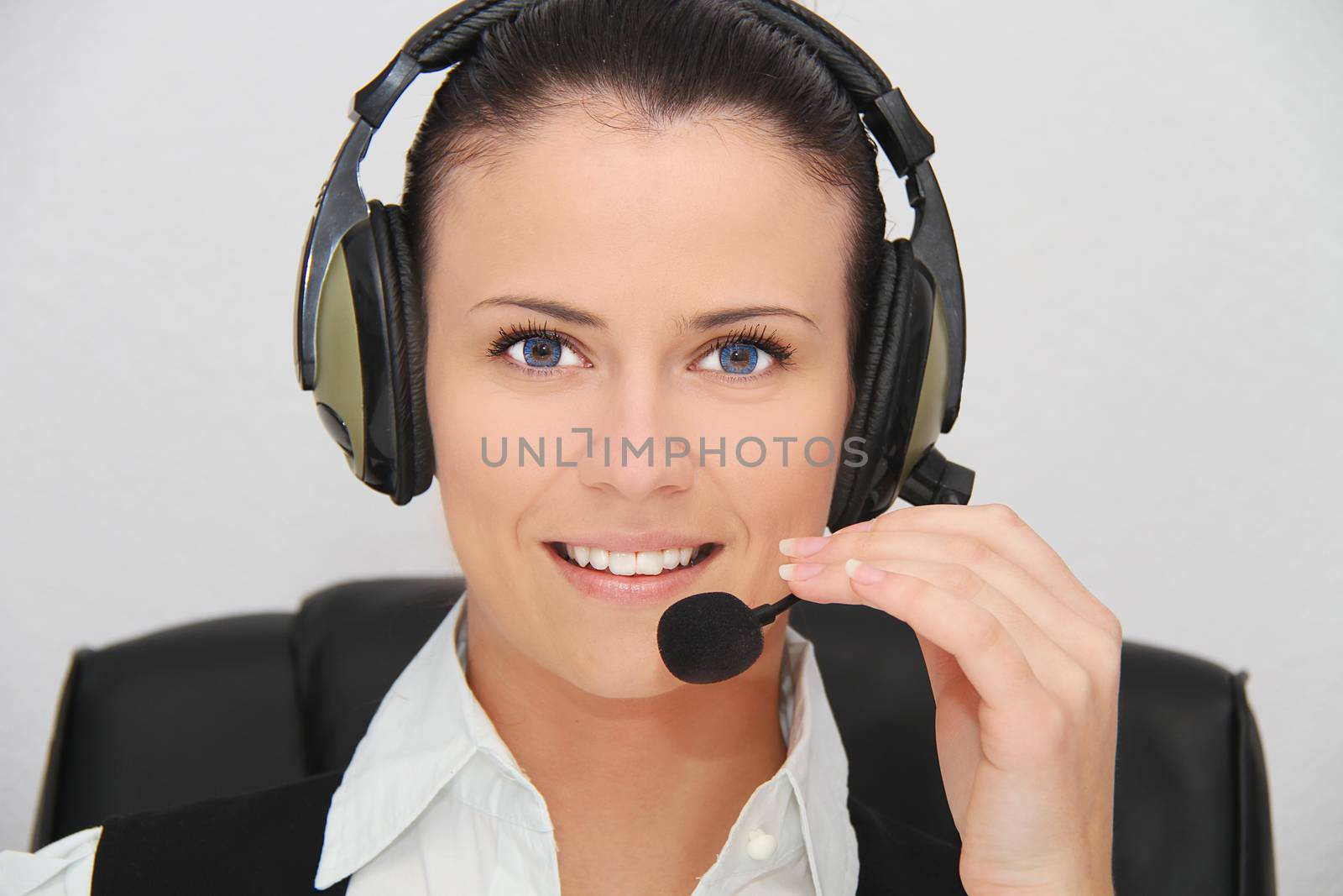 Female customer support operator with headset by mirzavis