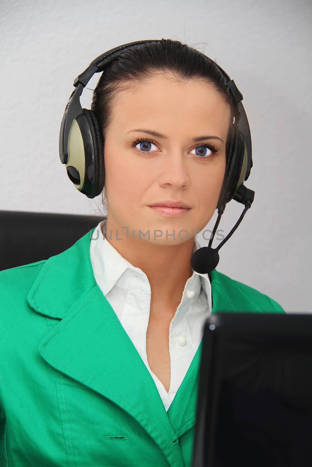 Female customer support operator with headset