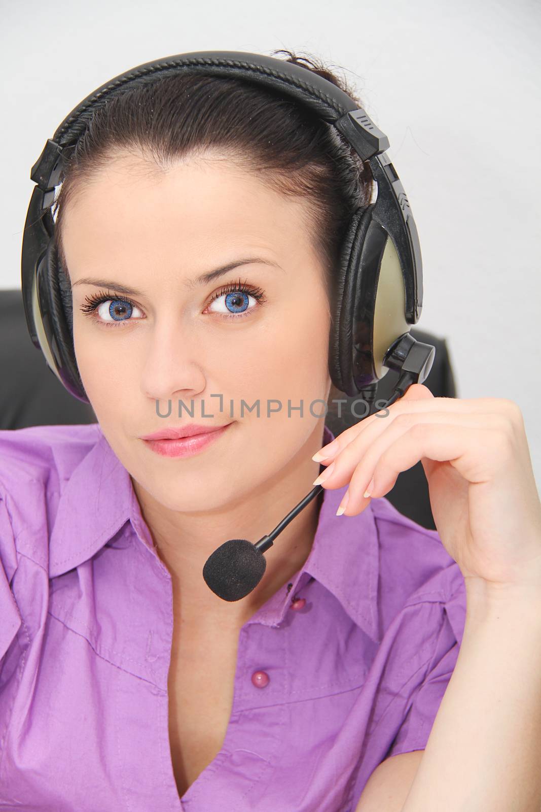 Female customer support operator with headset by mirzavis