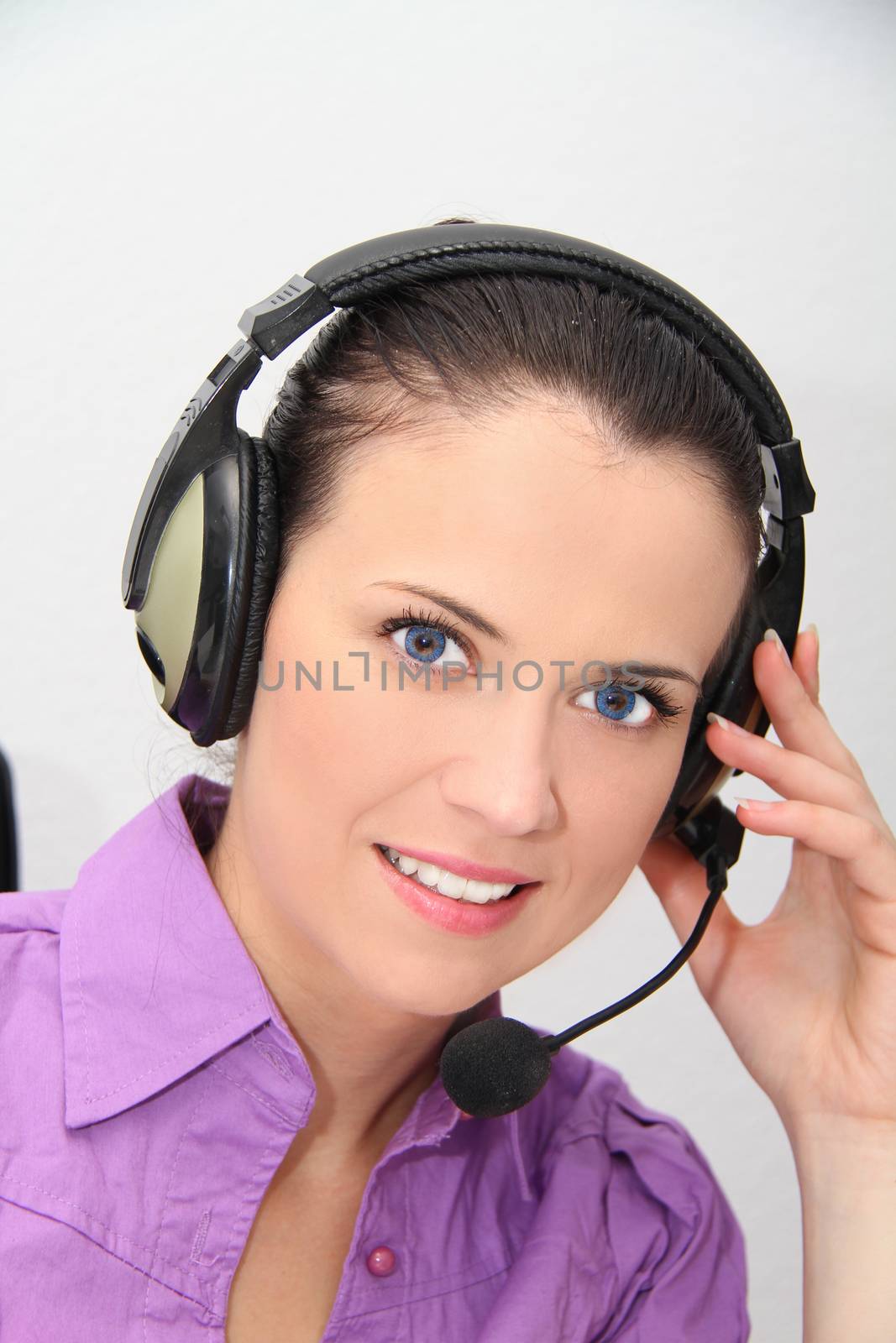 Female customer support operator with headset by mirzavis