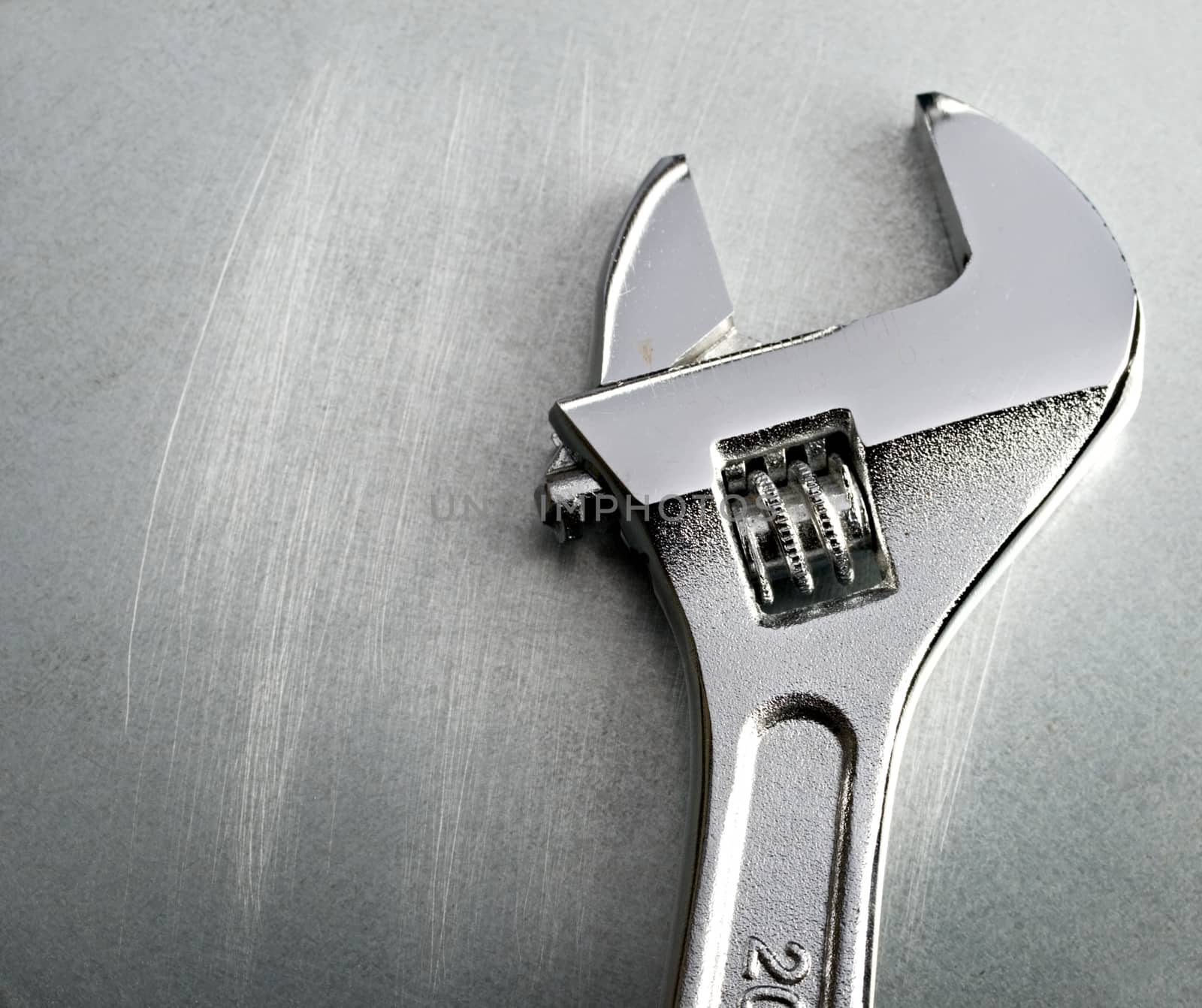 Spanner on the steel background