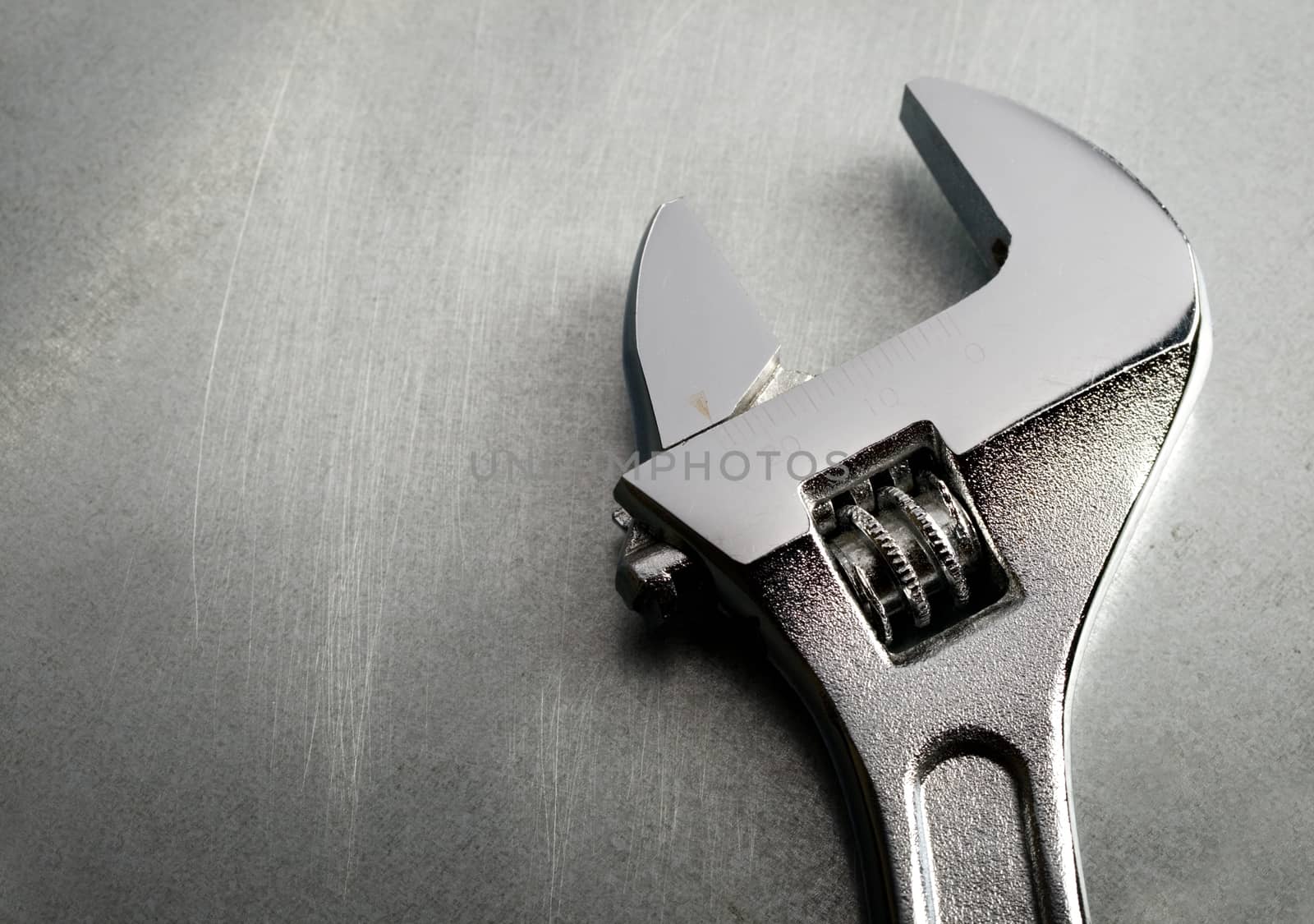 Spanner on the steel background