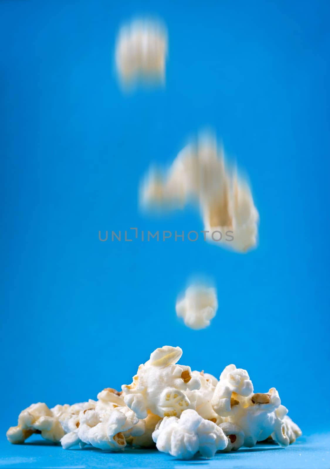 Popcorn on the blue background