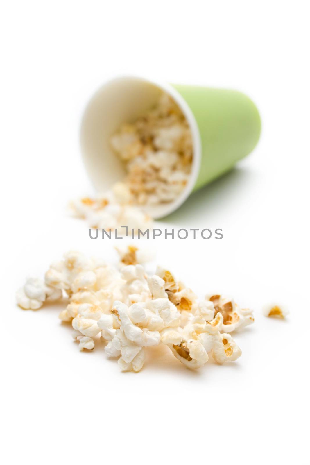 Popcorn in a green paper cup