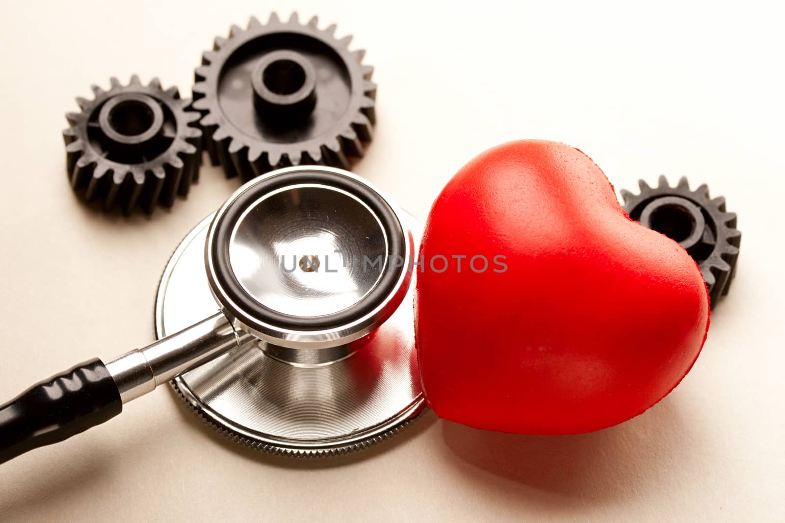 Mechanical ratchets, stethoscope and red heart by Garsya