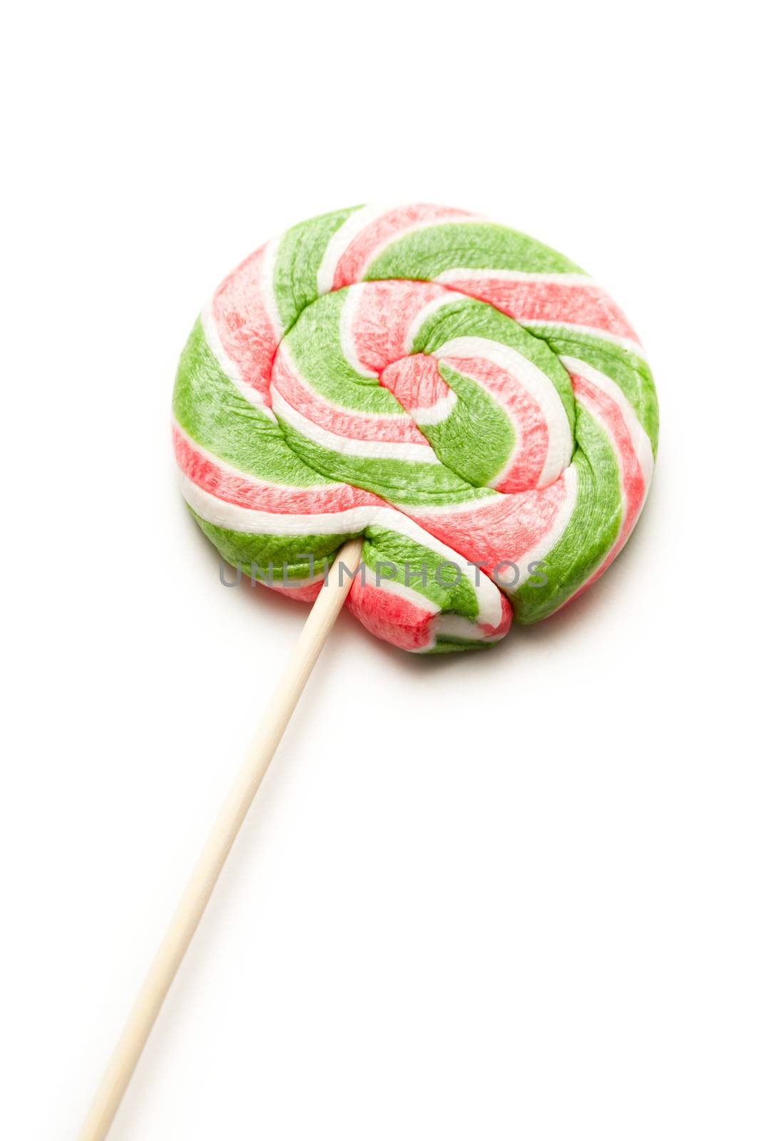 Bright lollipop candy on white background by Garsya