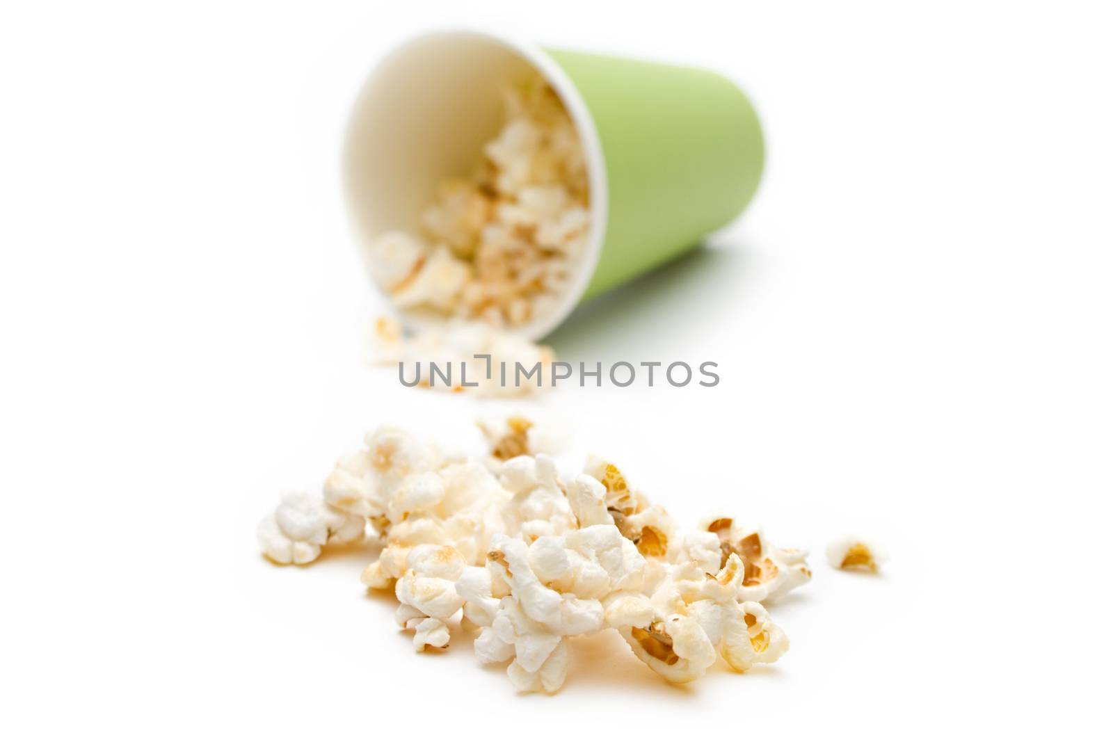 Popcorn in a green paper cup