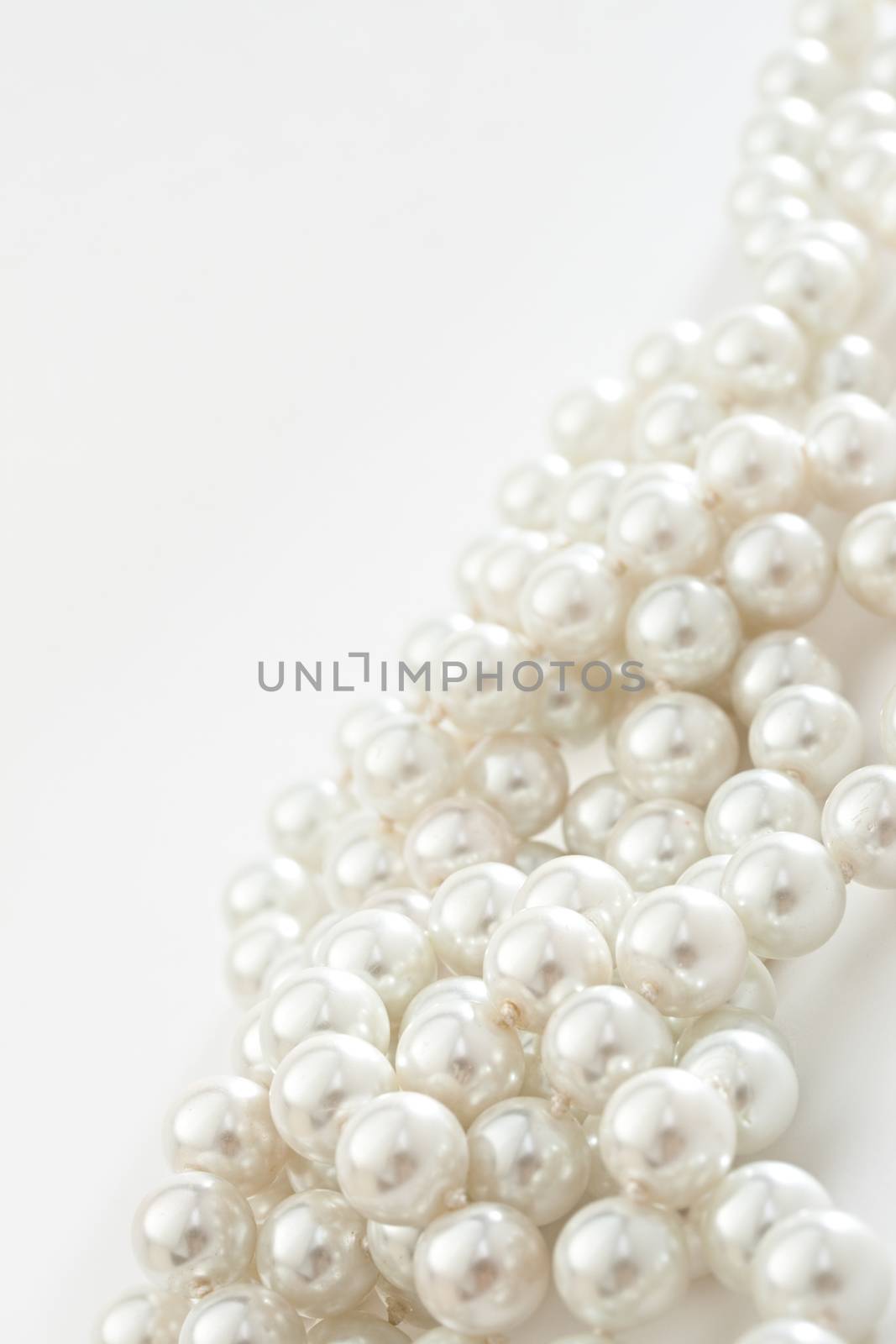 String of pearls on white
