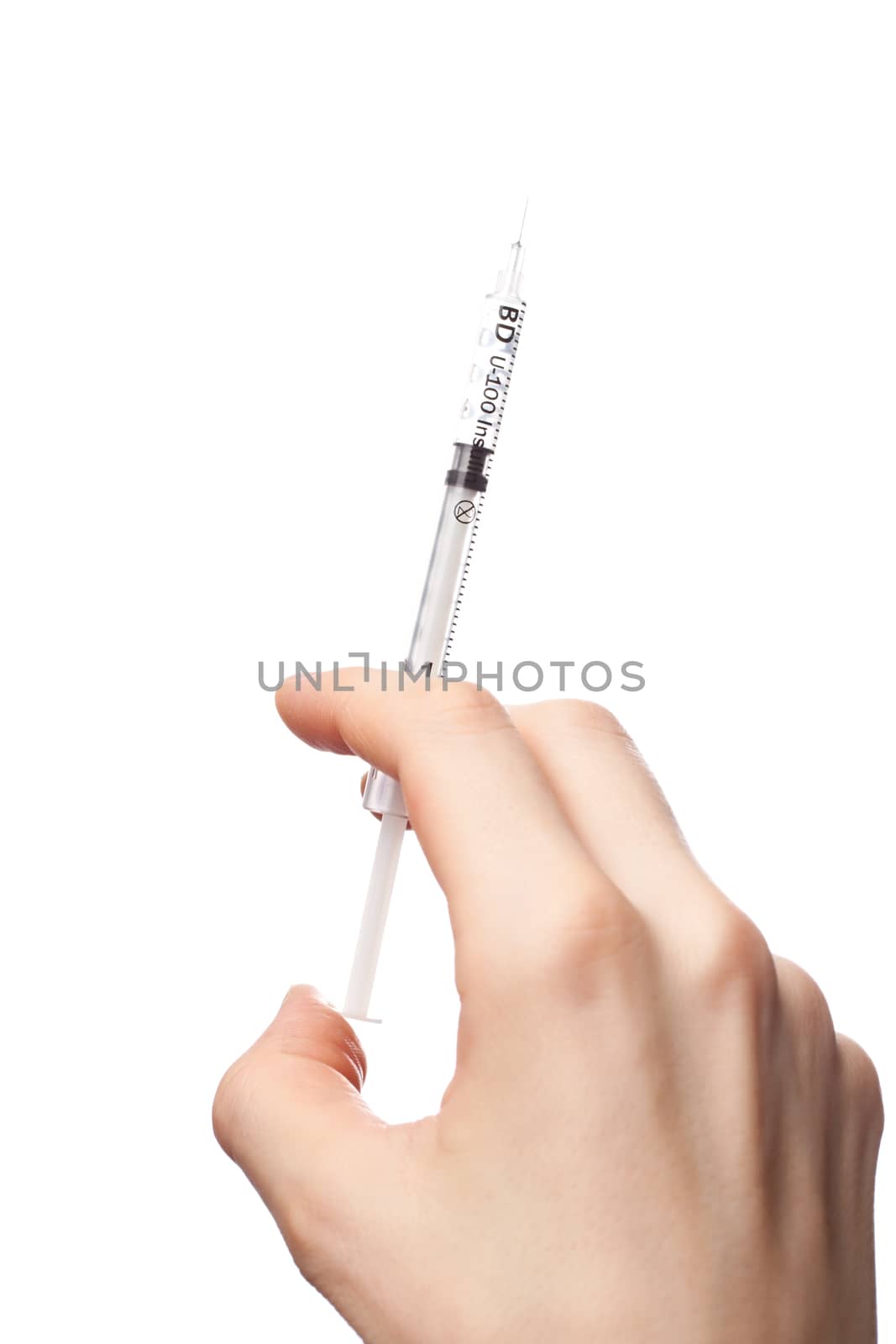 Female hand with syringe