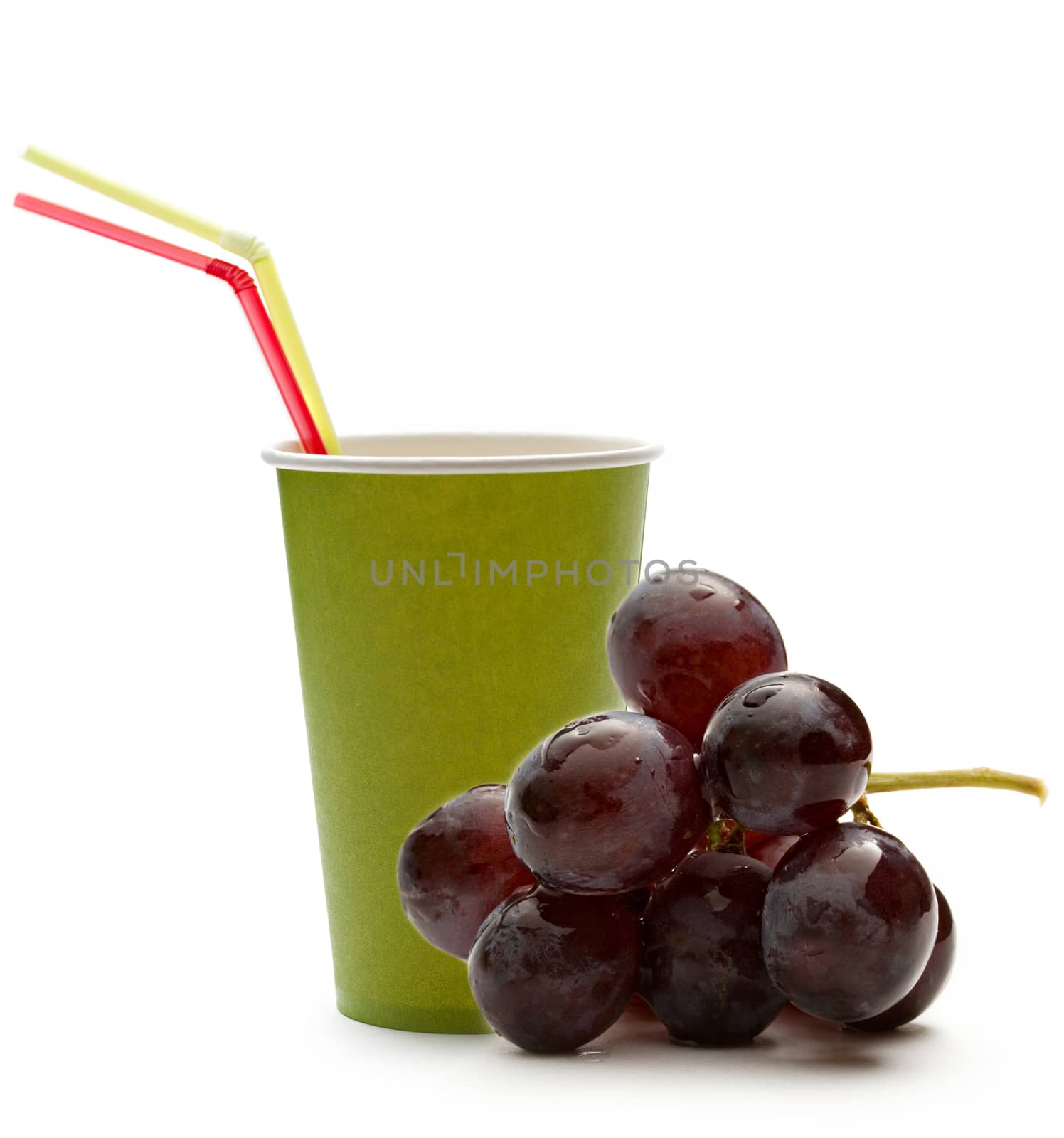 Paper cup with straws and grapes