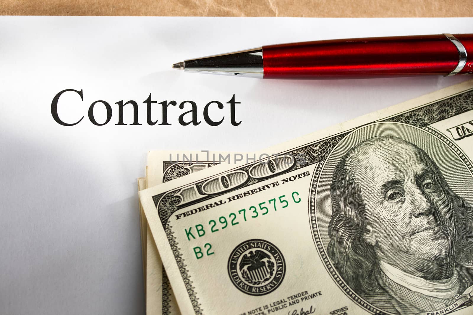 Contract conception with money and pen