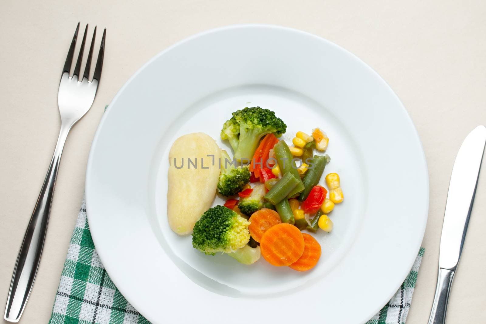Fried vegetables on the plate