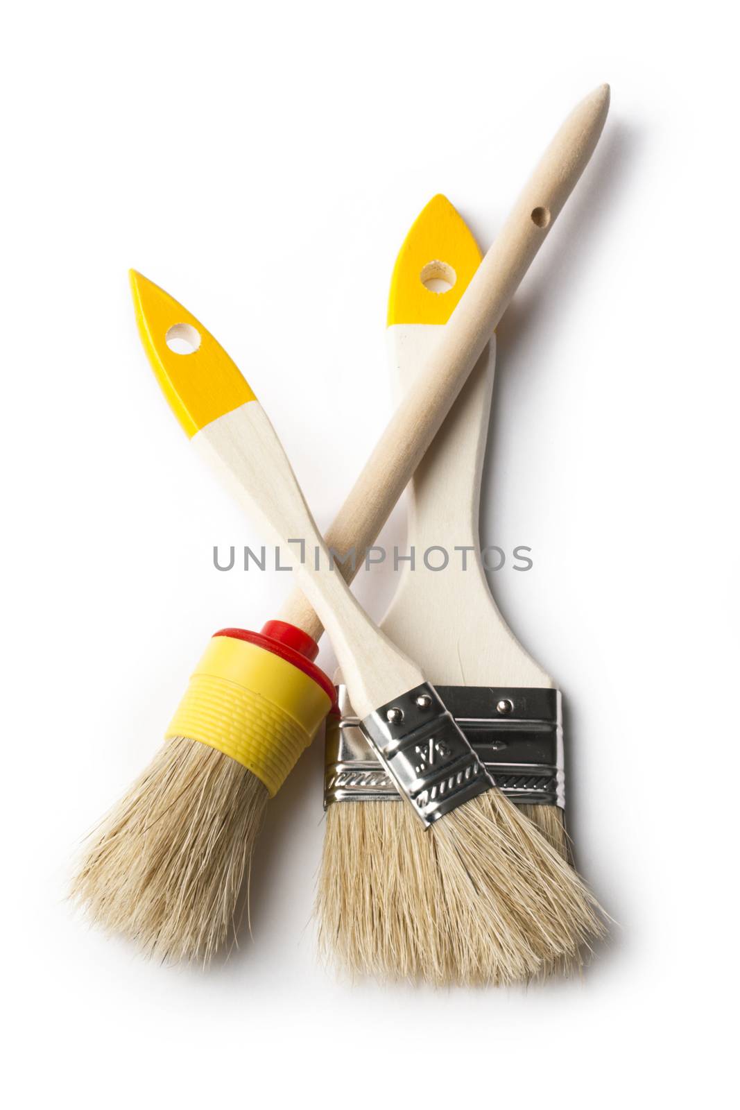 Paint brushes on the white background 