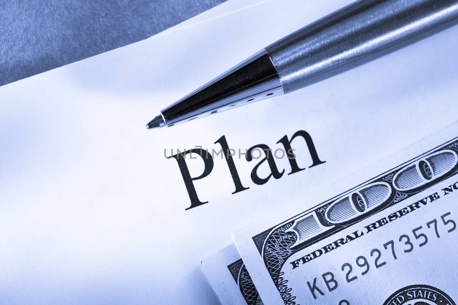 Plan conception with pen and money