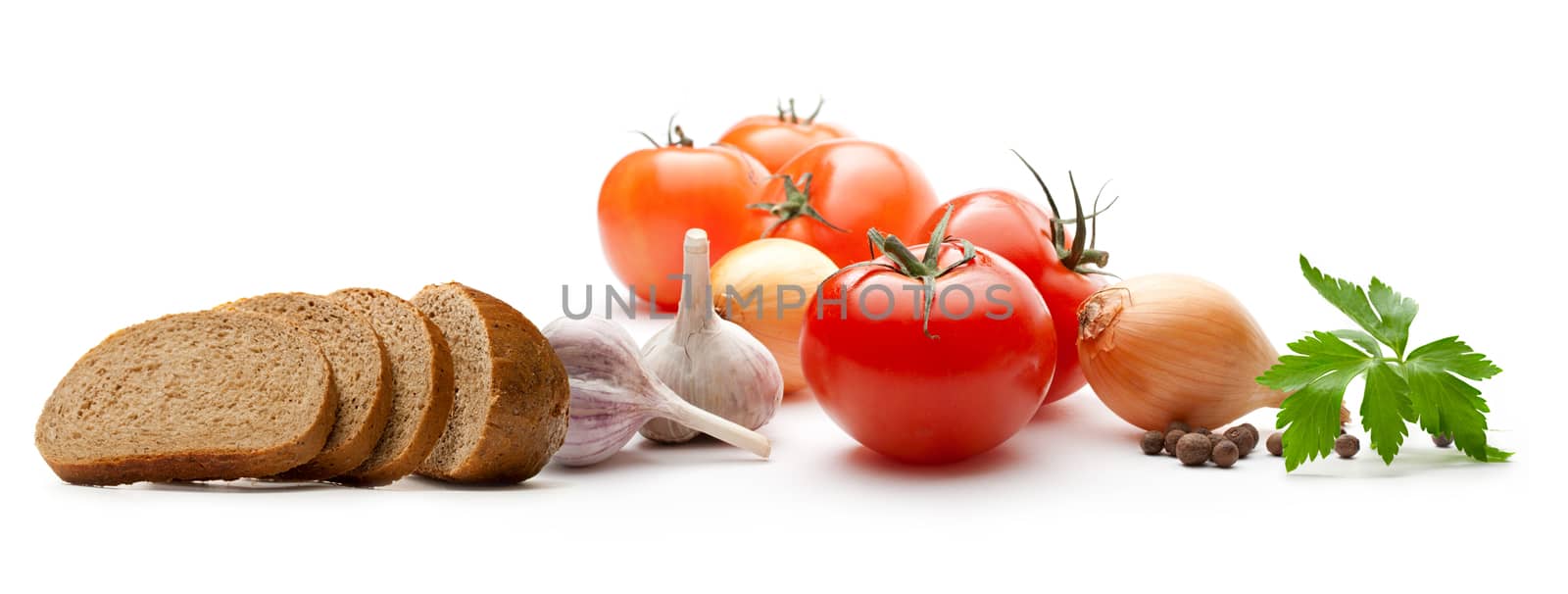 Vegetables with bread on white