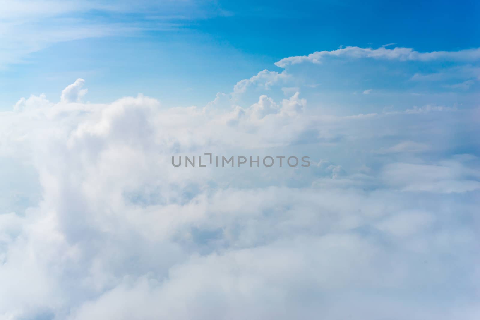 The View from the plane above the cloud and sky by iamway