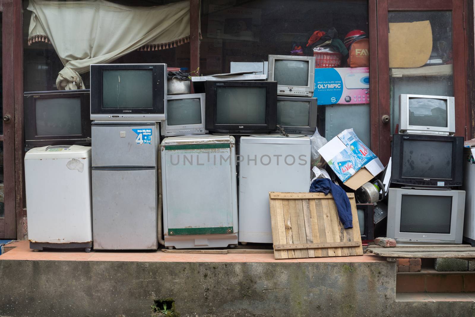 The remains Wreck of the damaged television and some Electronic goods