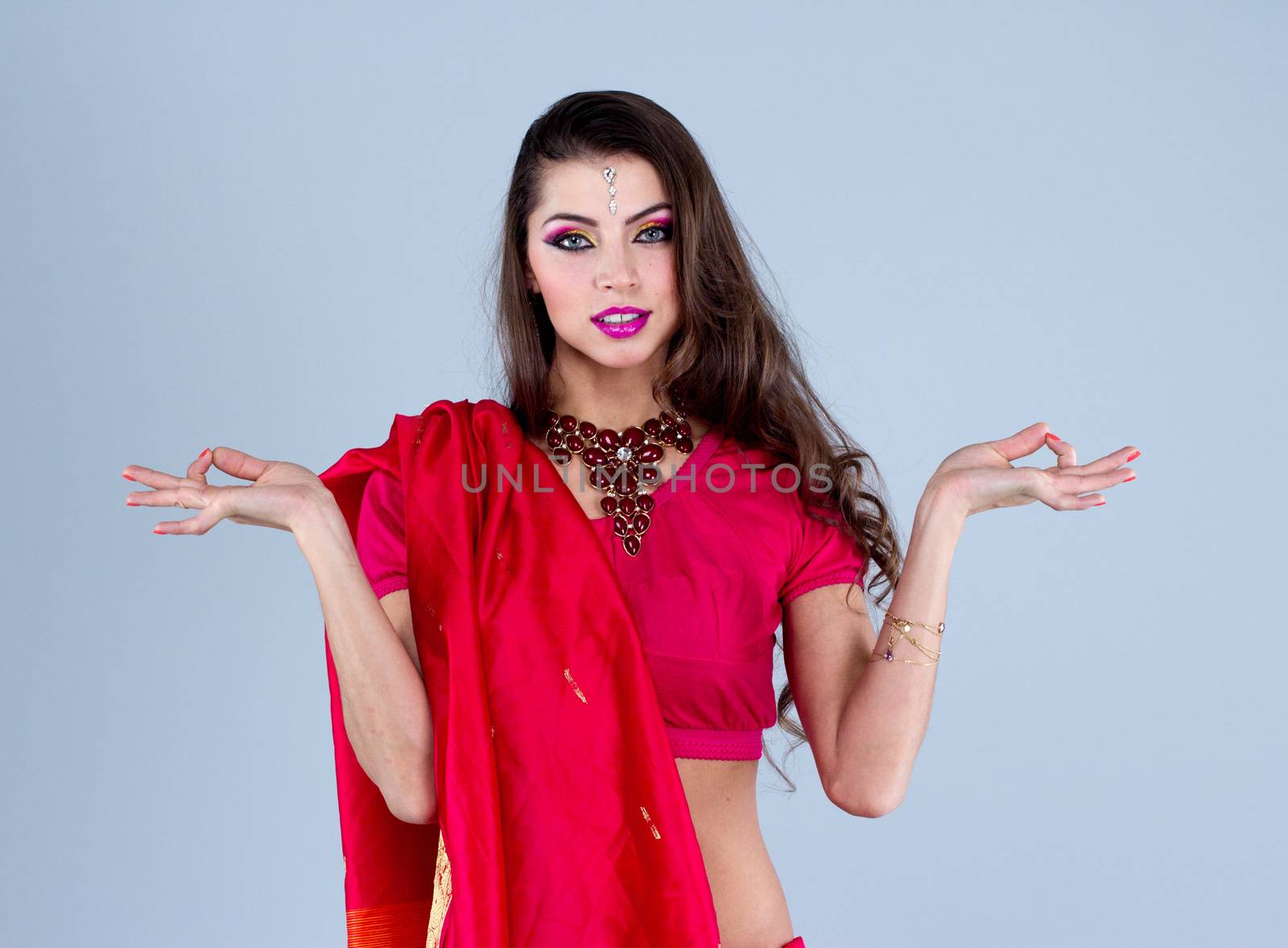 Beautiful Indian girl dancing in national dress