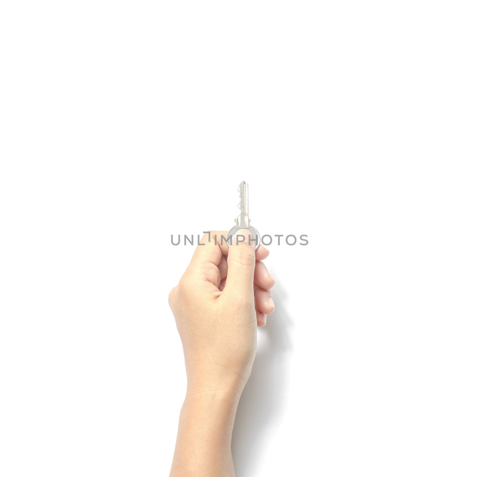 woman hand holding key on a white background