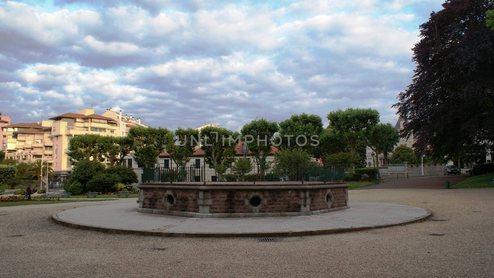 Nice square in Biarritz, France. Trees and houses are around