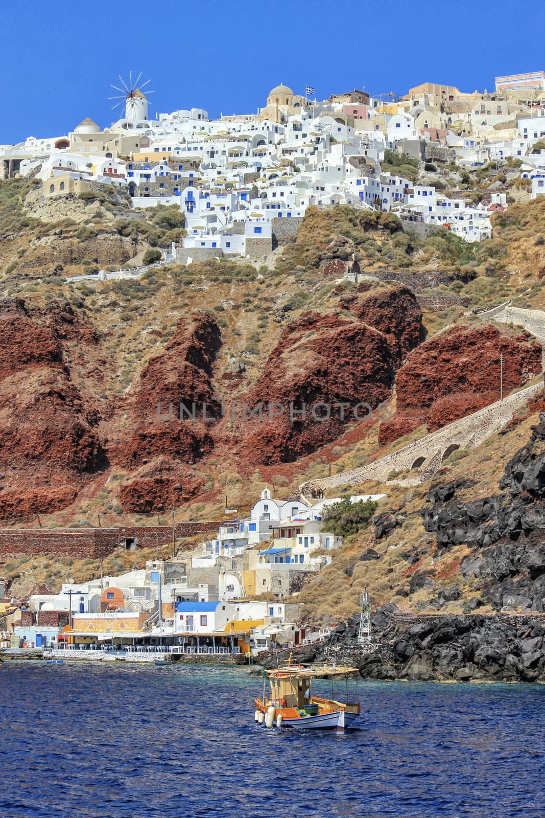 Oia village on Santorini island, north, Greece by Elenaphotos21