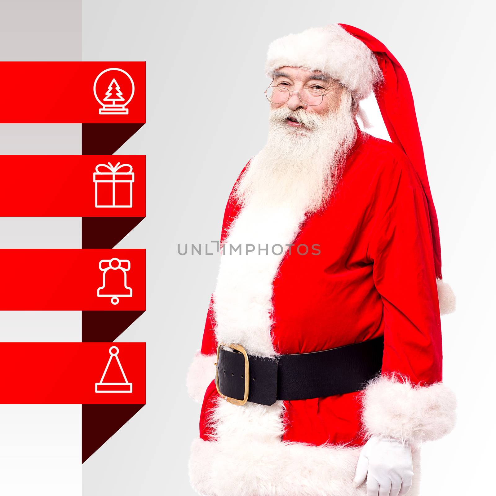 Santa standing with x-mas tags by stockyimages