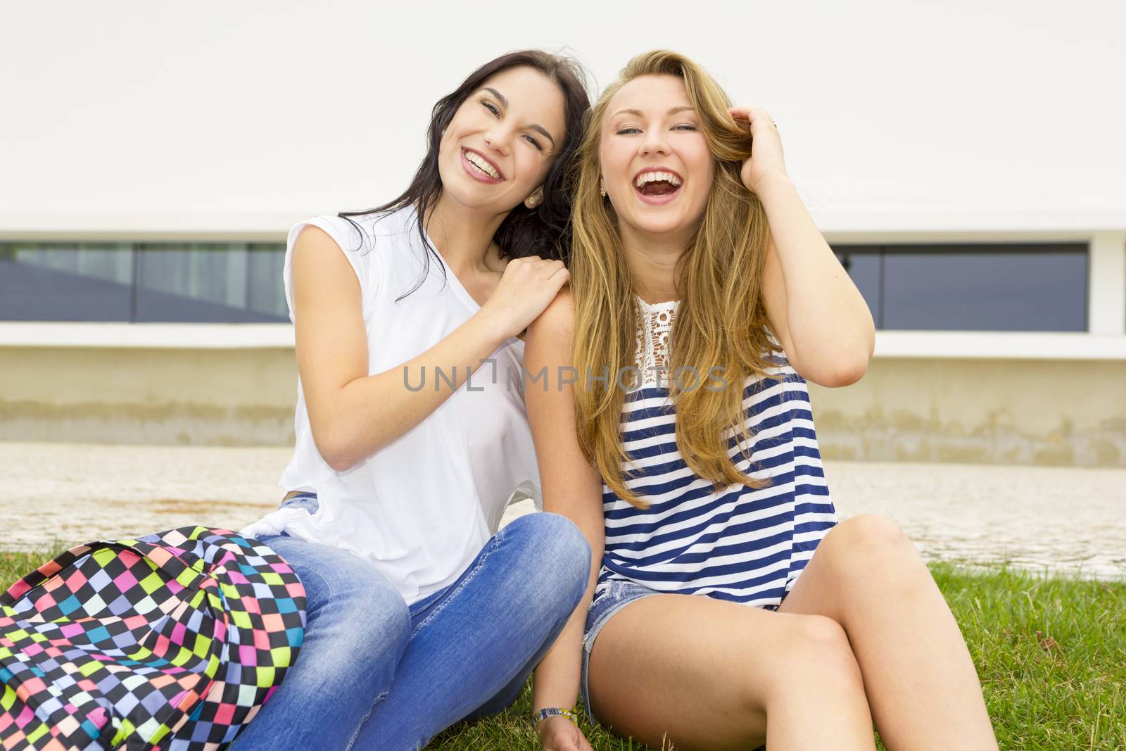 Beautiful and happy teenage students in the school