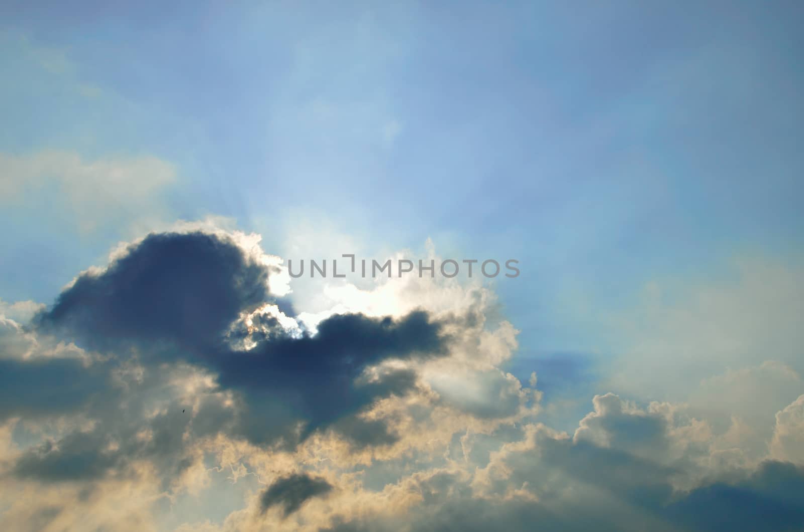 Sun ray with cloud in sky