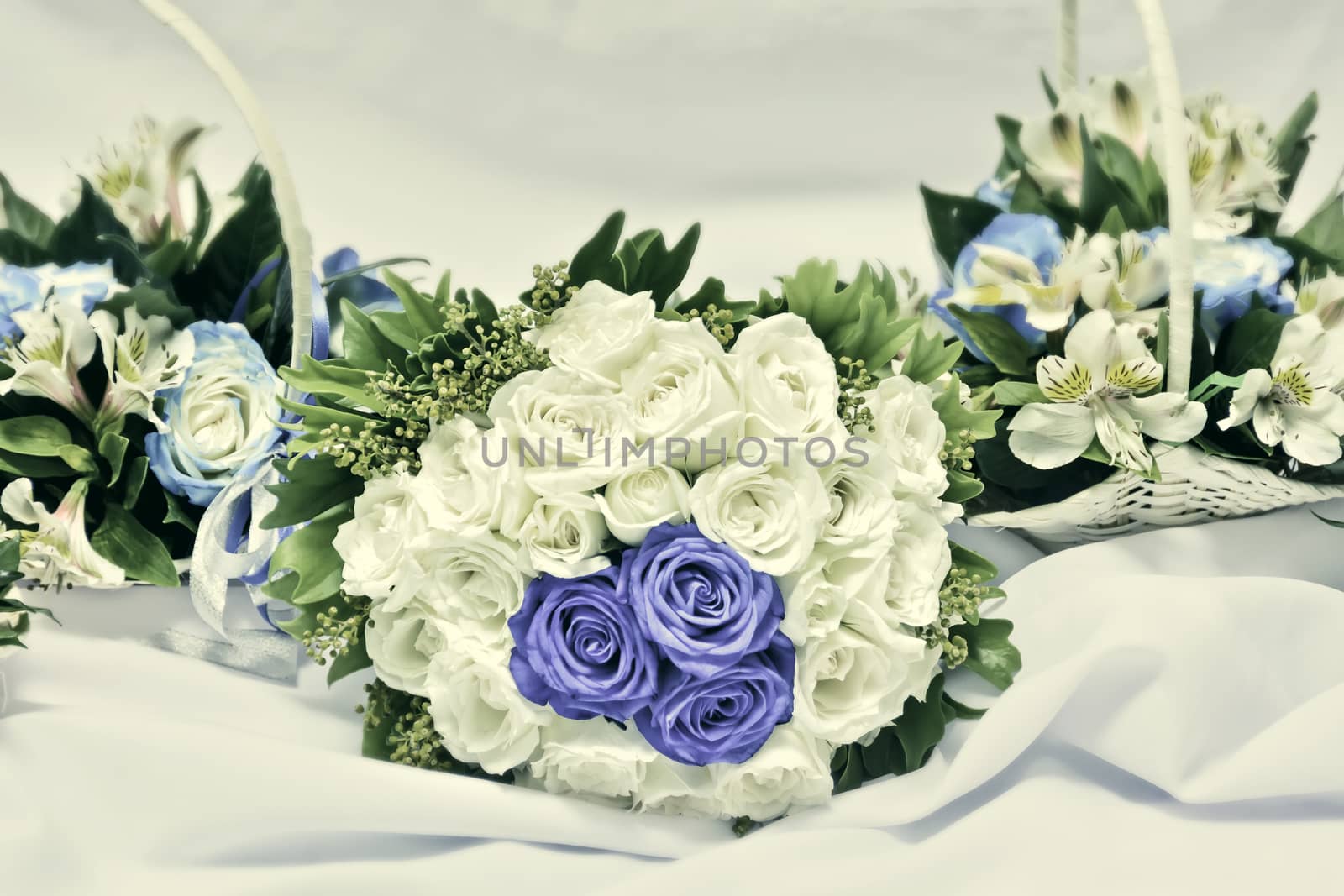 Bride and bridesmaids vintage-colored wedding bouquets