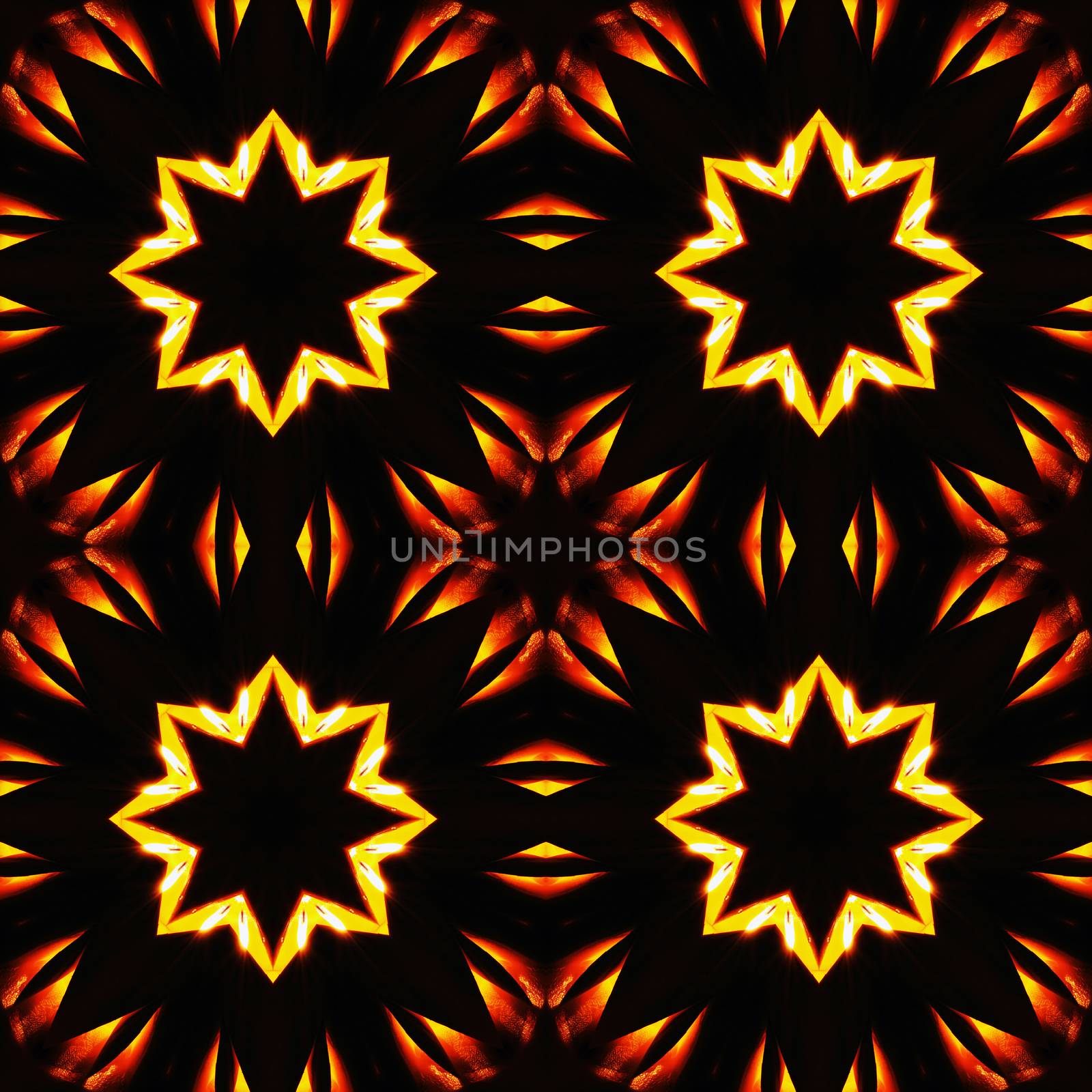 Abstract seamless pattern, fiery stars on a black background