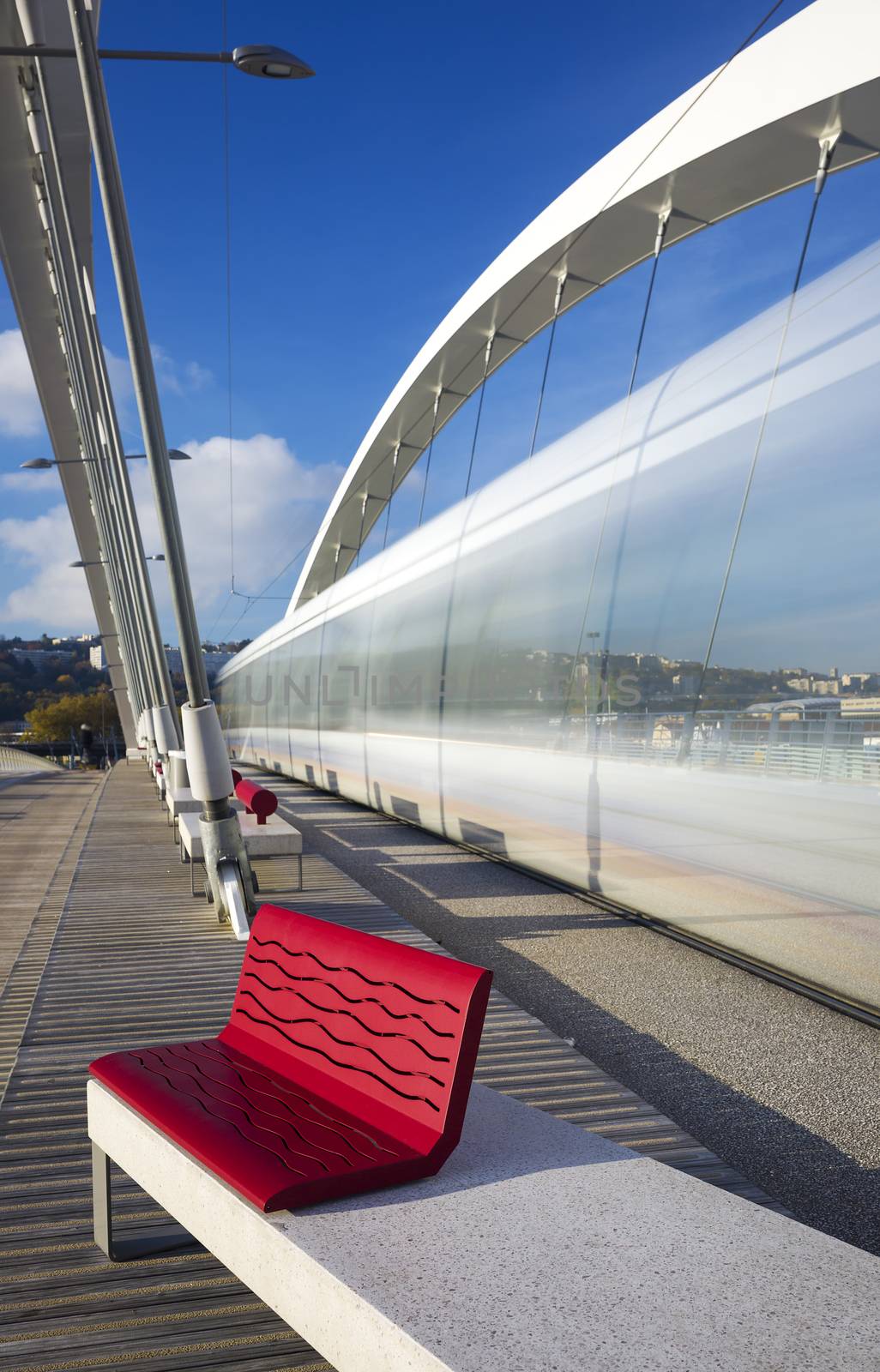 Vertical view of Tramway crossing the bridge, Lyon, France.