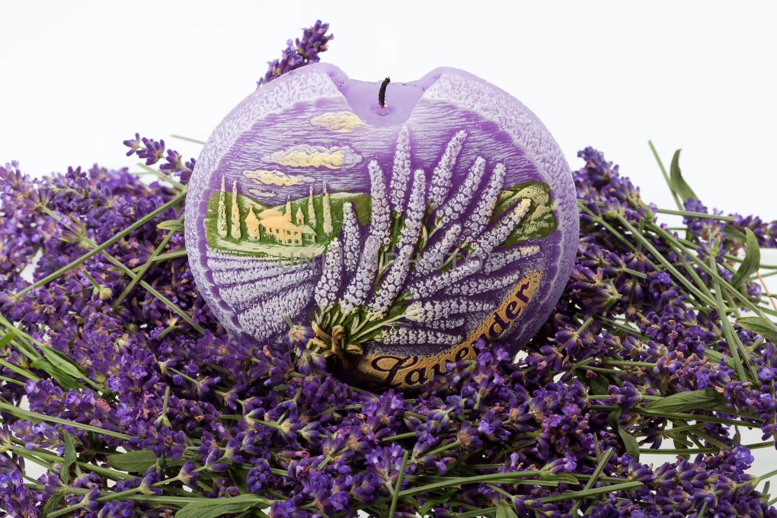  Lavender and candle  isolated on white background