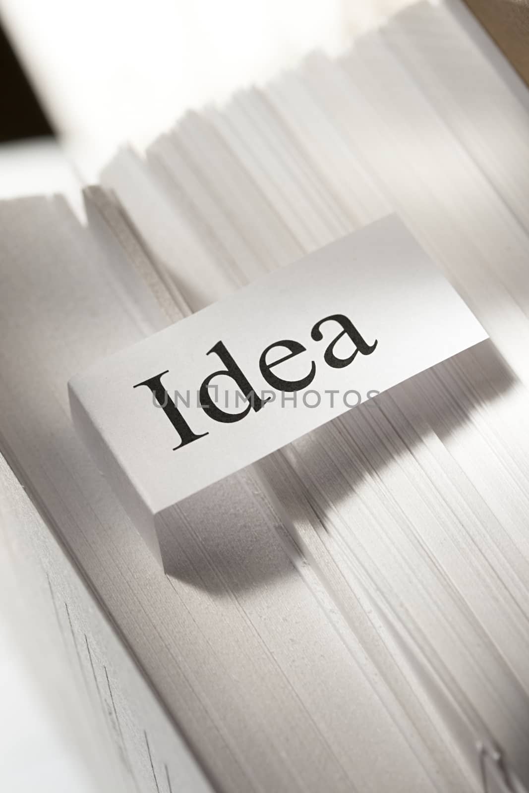 Idea conception with stack of paper cards by Garsya