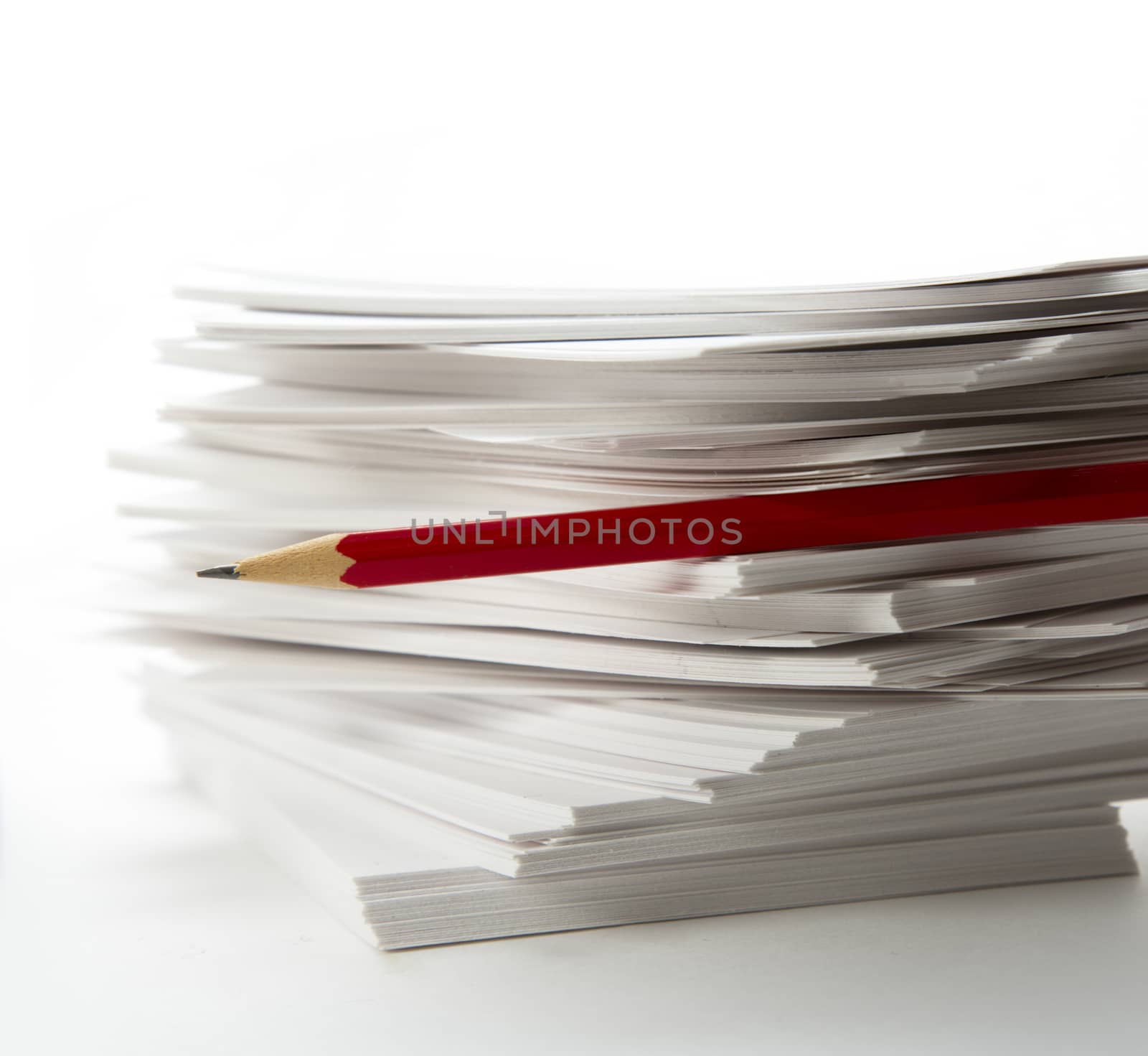 Stack of paper cards and pencil