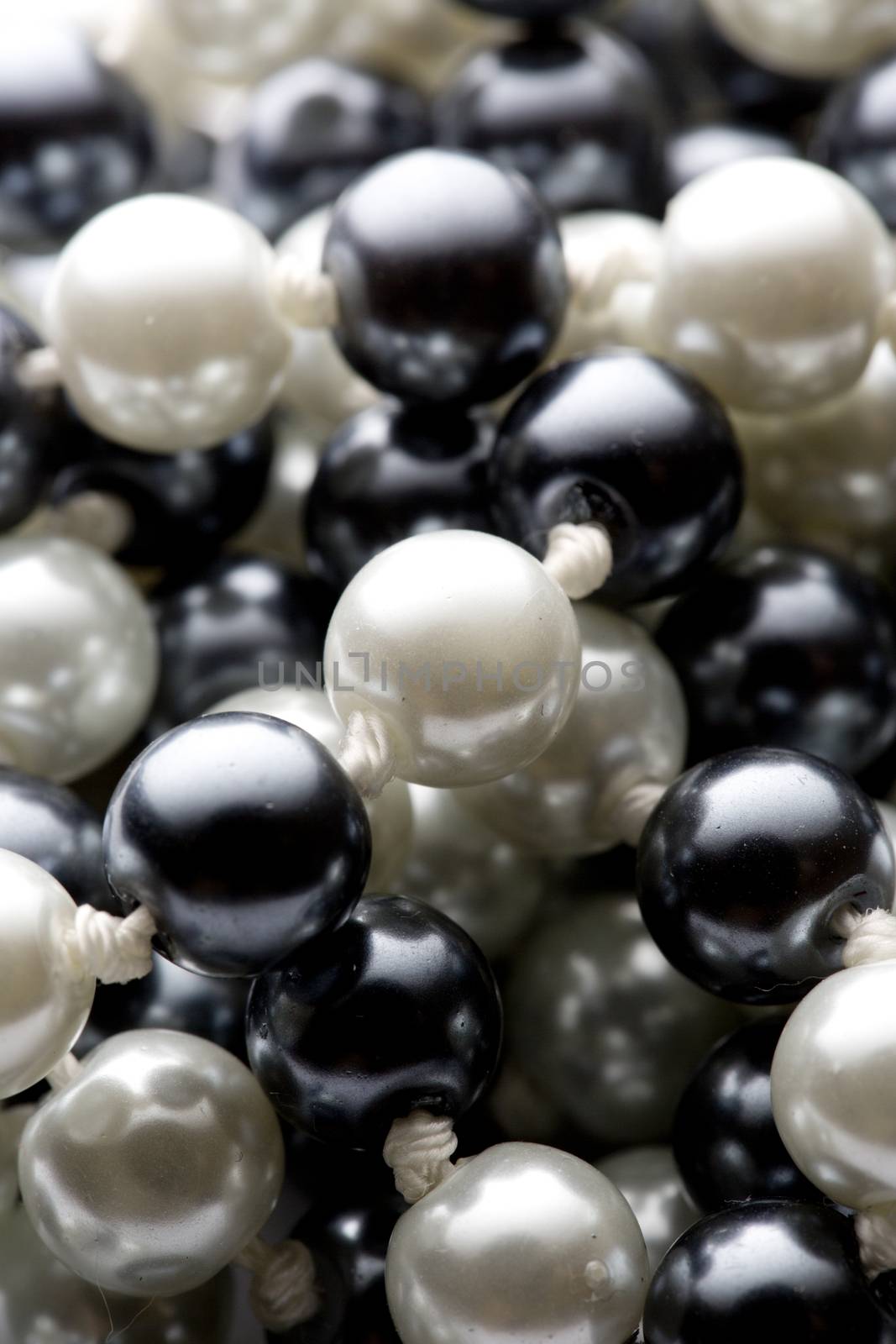 String of black and white pearls