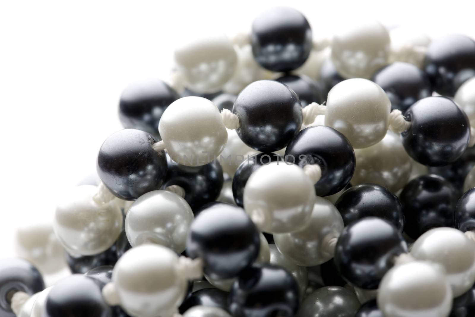 String of black and white pearls