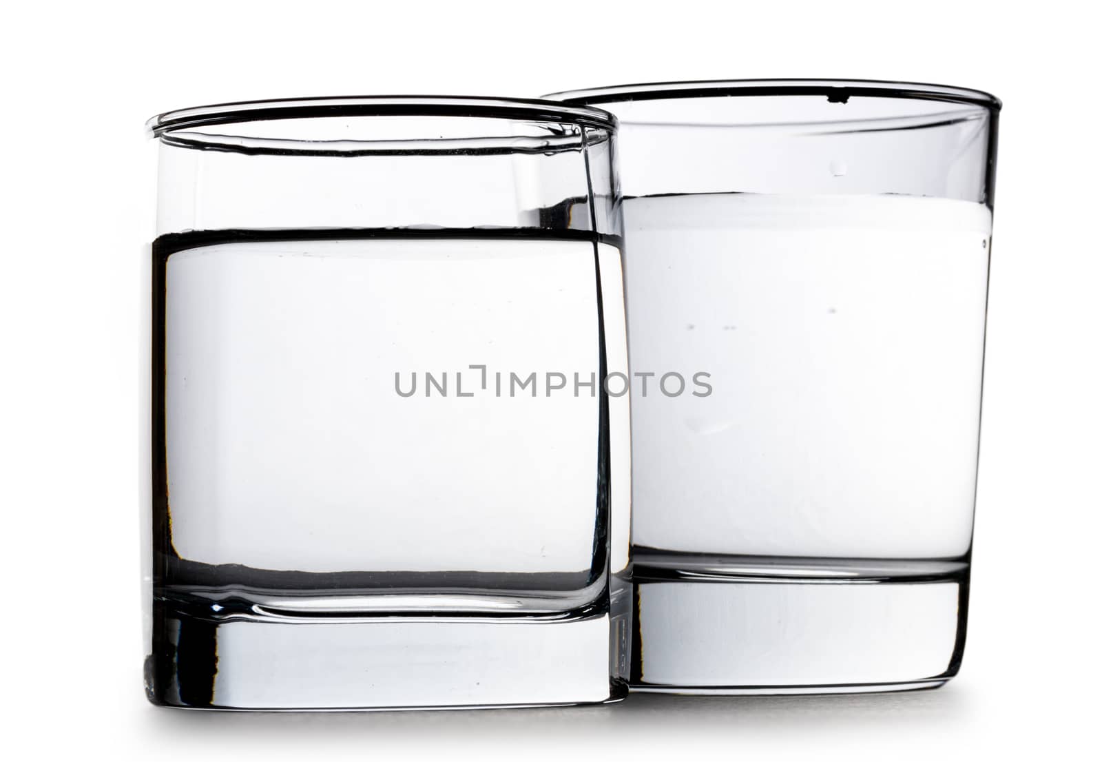 Two glasses of water on white background by Garsya