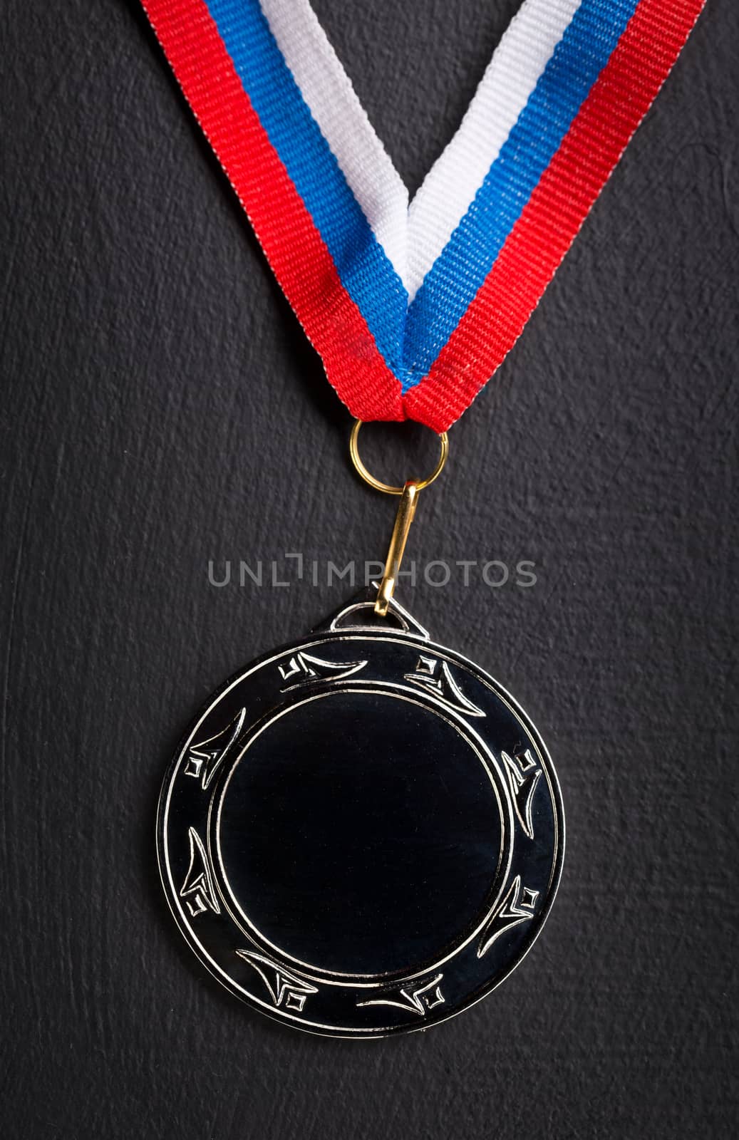 Metal medal with tricolor ribbon 