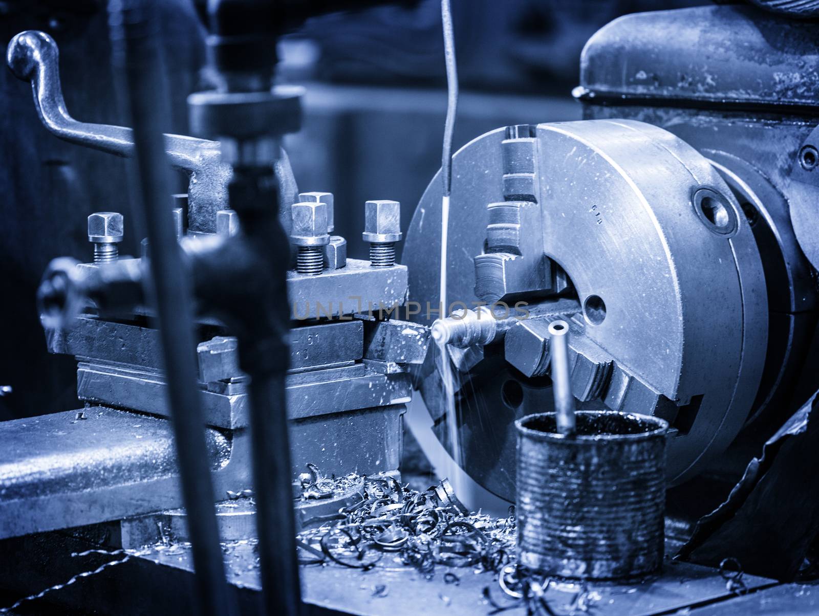 Turning lathe in the workshop in blue