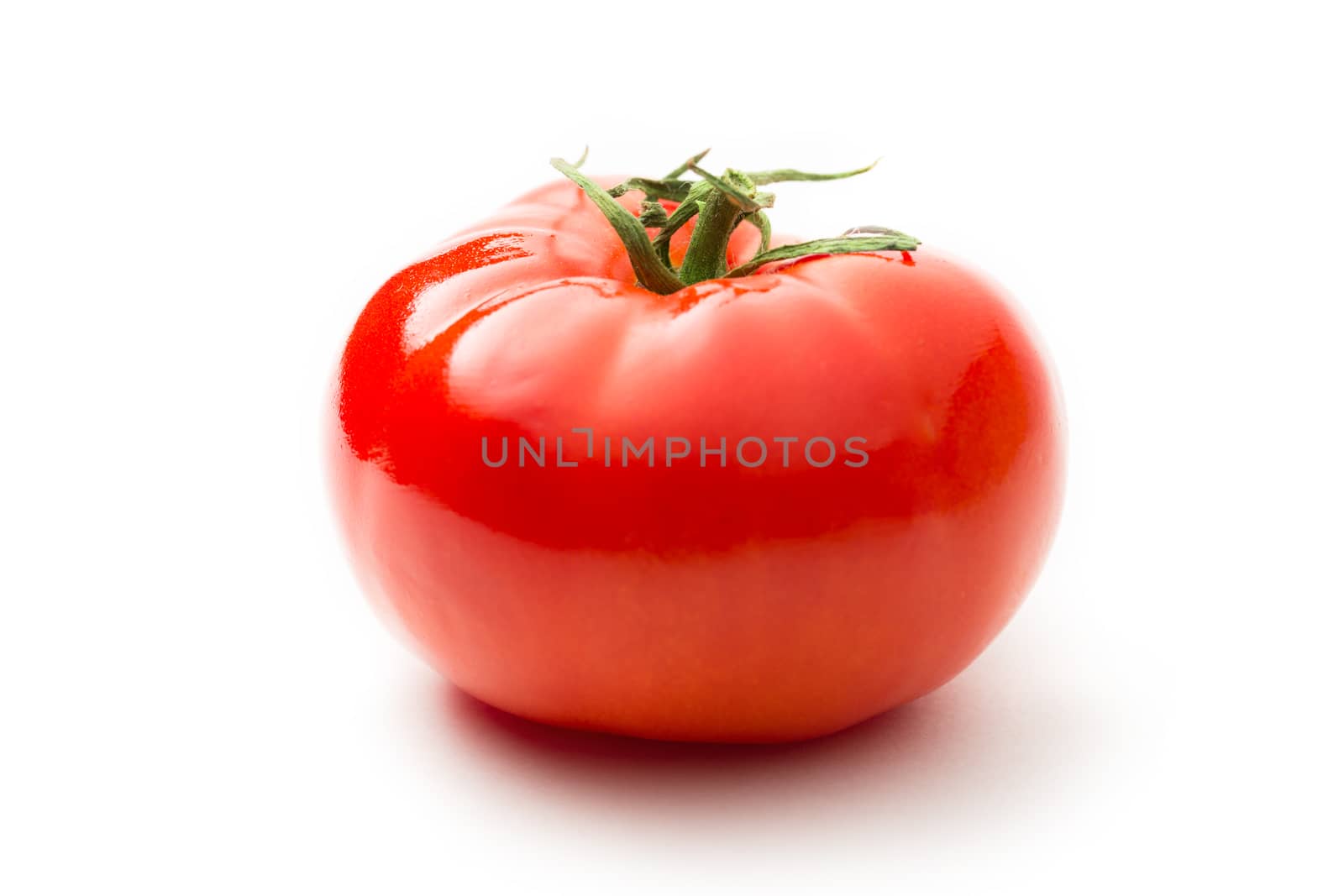 Fresh tomato on white by Garsya
