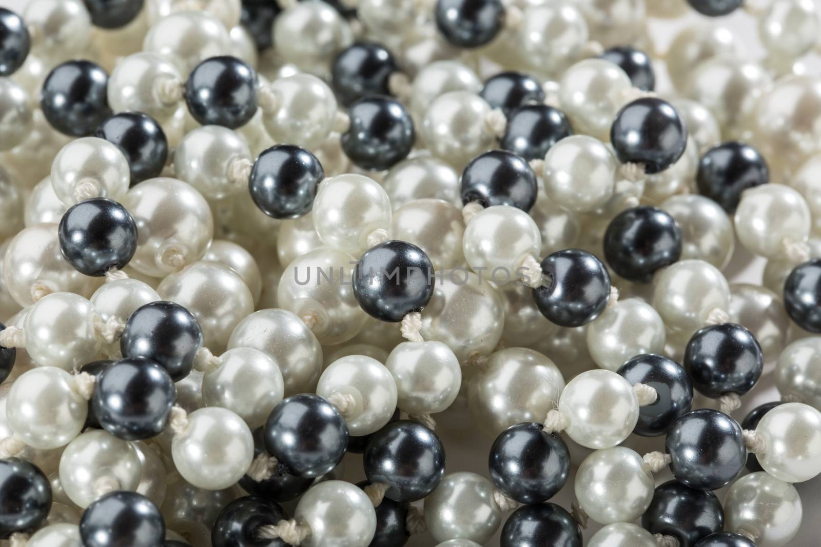 String of black and white pearls