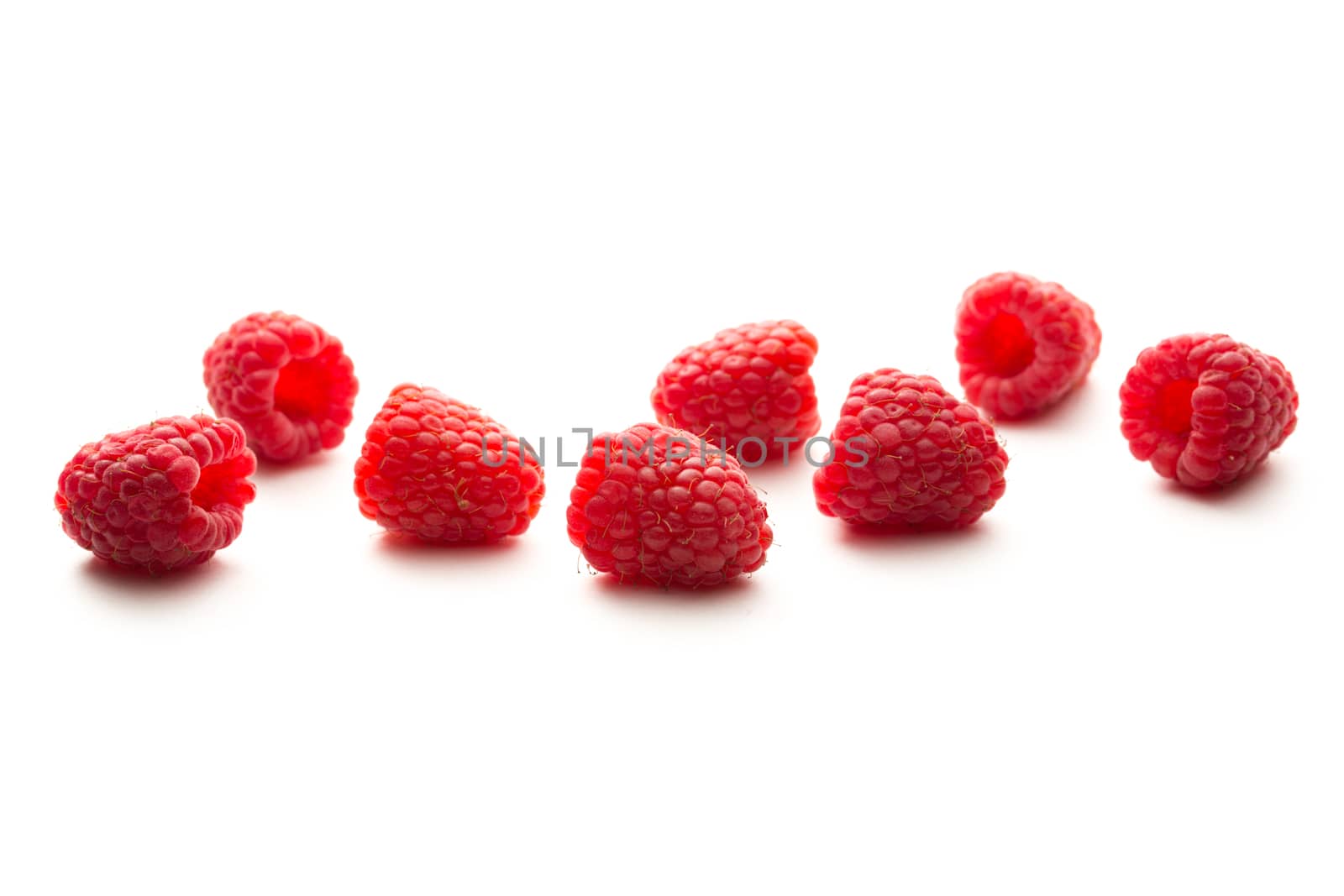 Fresh raspberry on white background